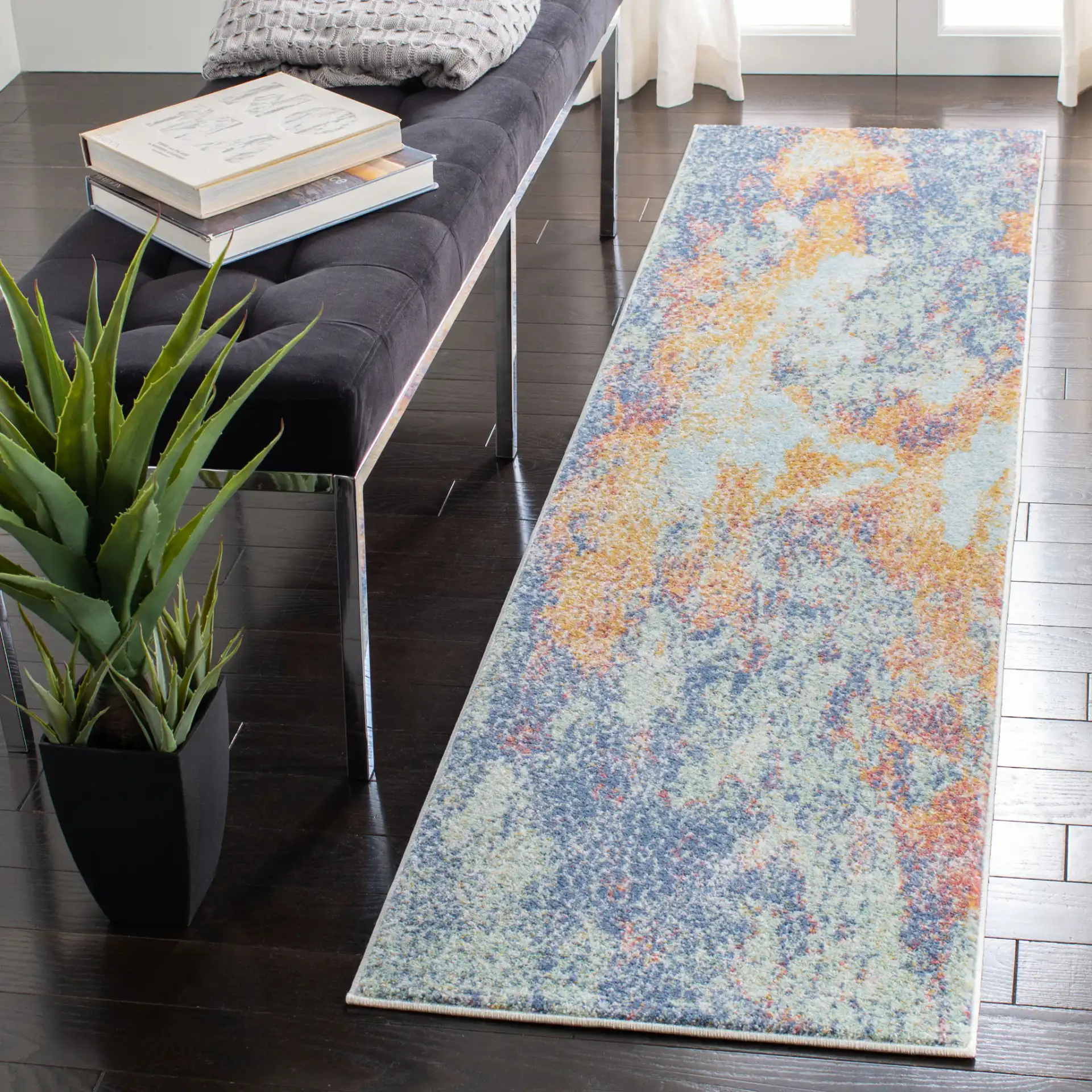 Prism Pebble Rug in Cream / Blue in a styled room