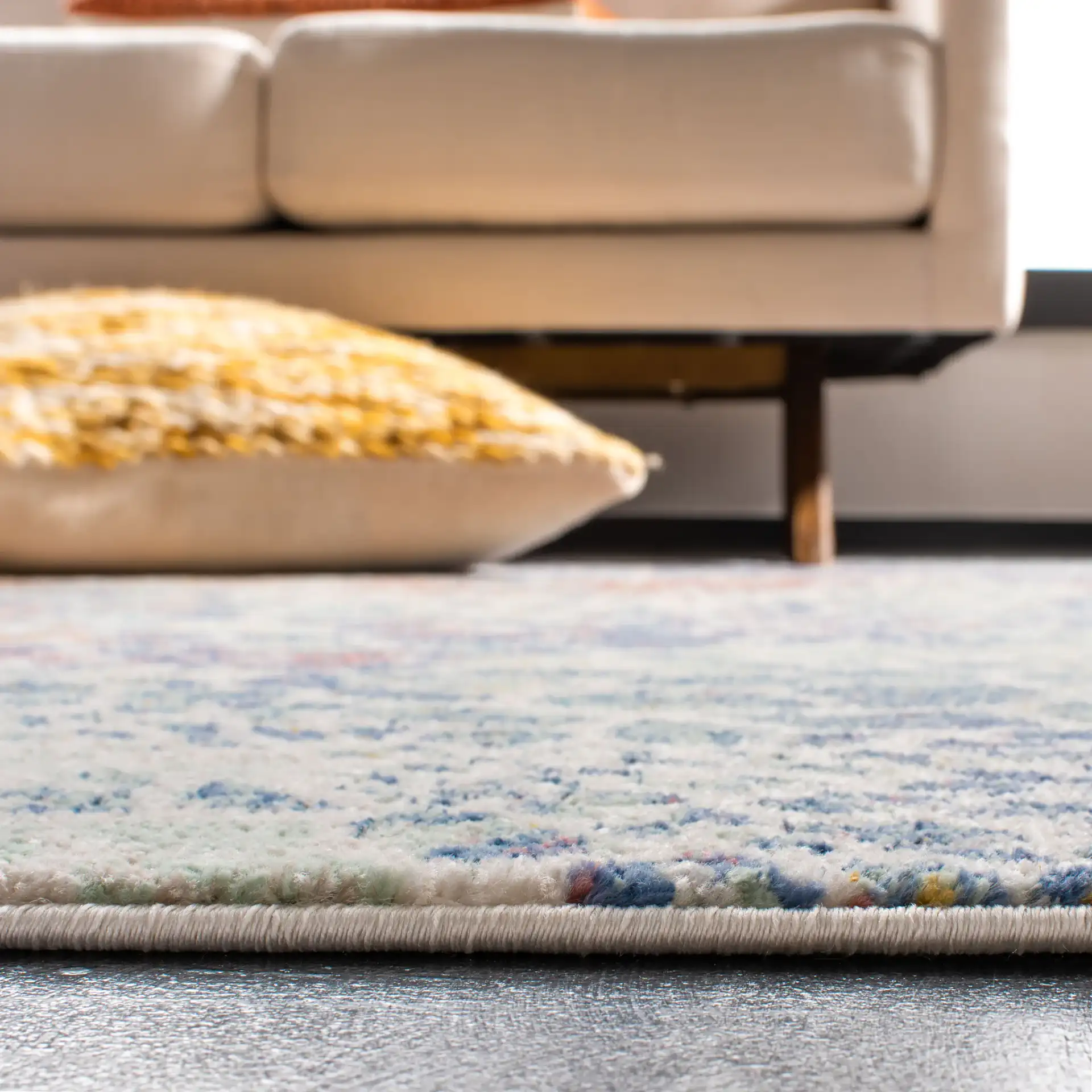 Prism Pebble Rug in Cream / Blue in a styled room