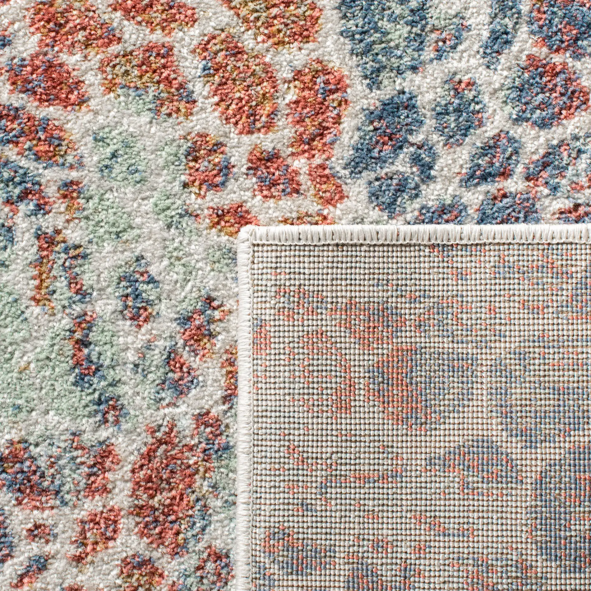 Prism Pebble Rug in Cream / Blue in a styled room