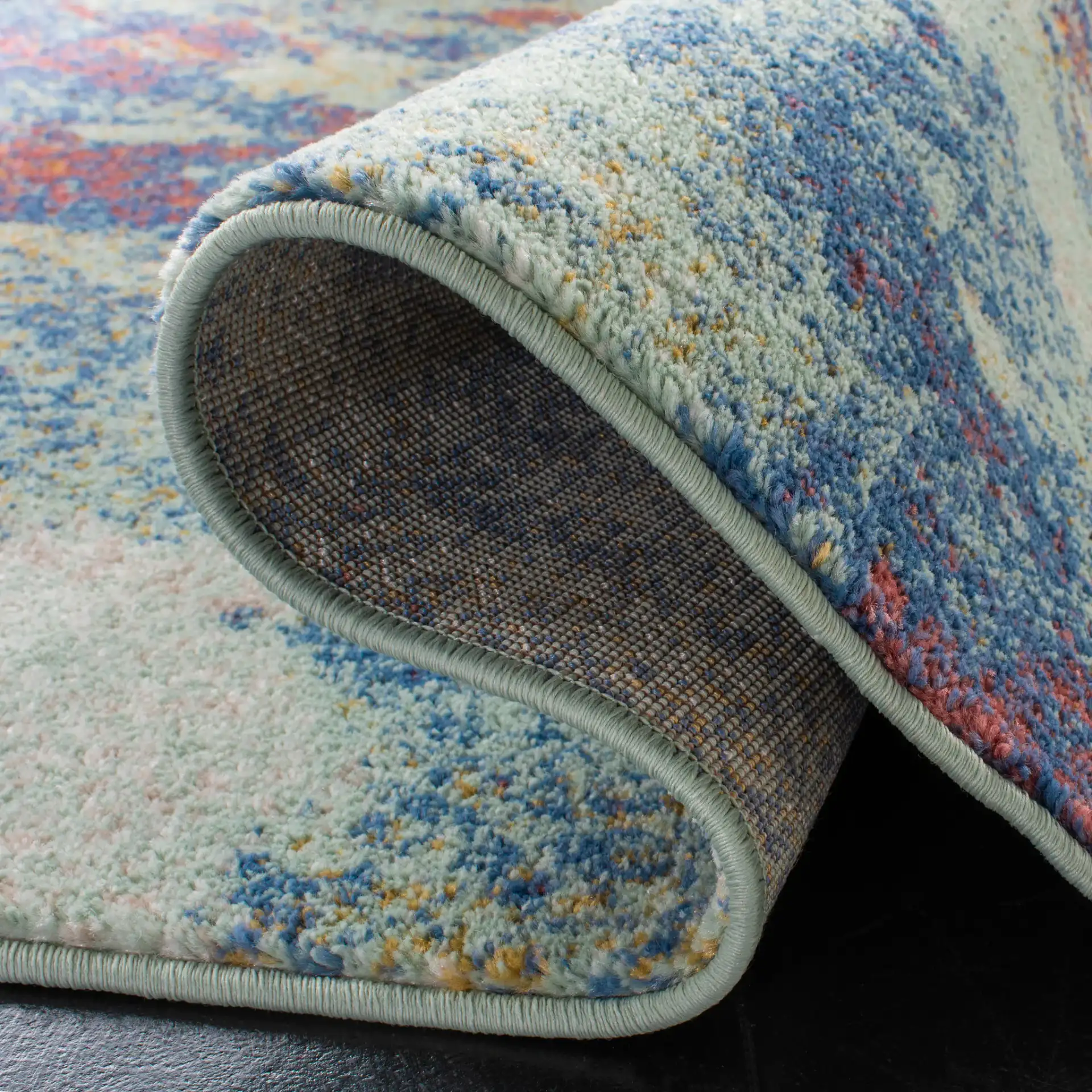 Prism Abstract Rug in Cream / Aqua in a styled room
