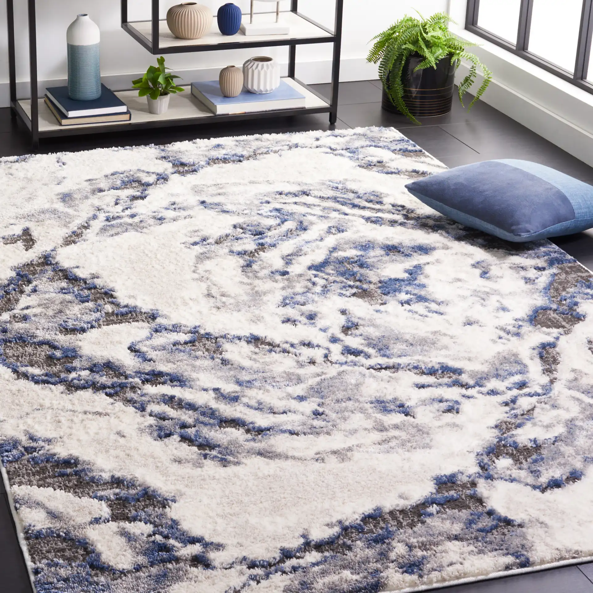 Petra Marbled Rug in Ivory / Blue in a styled room