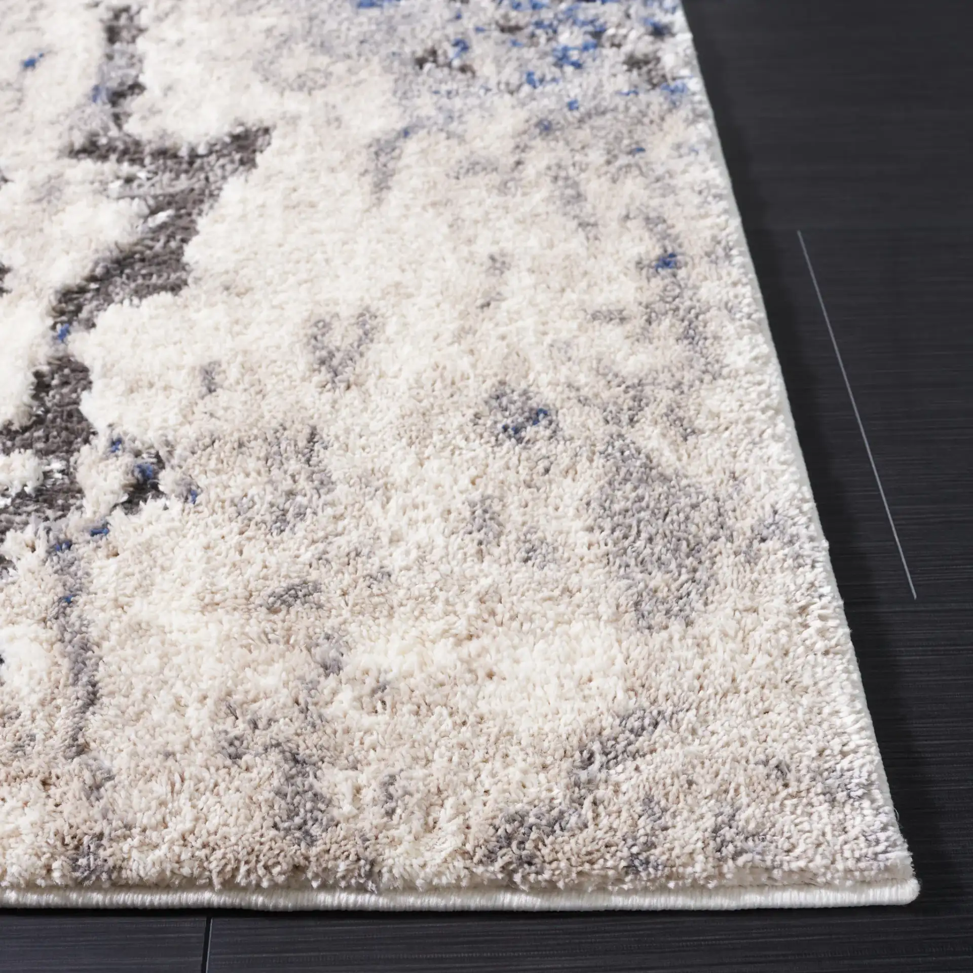 Petra Marble Rug in Ivory / Light Gray in a styled room