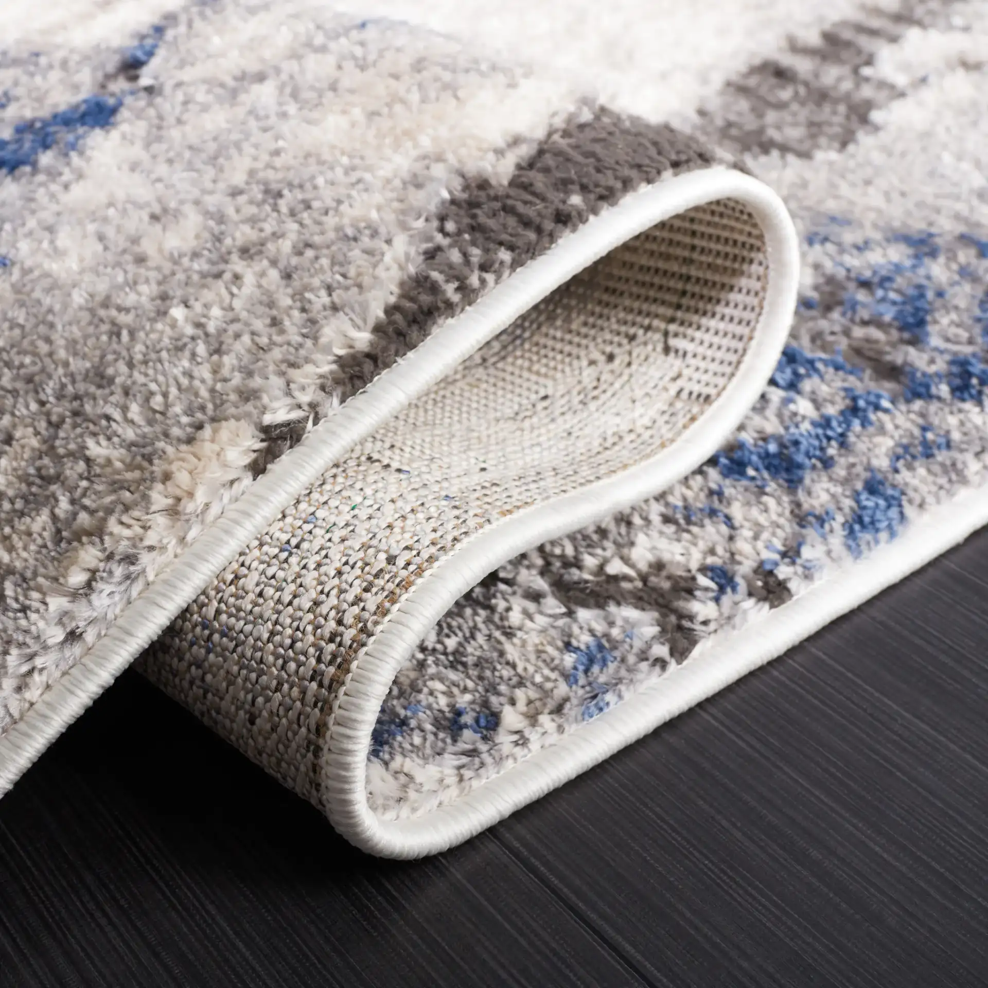 Petra Marble Rug in Ivory / Light Gray in a styled room