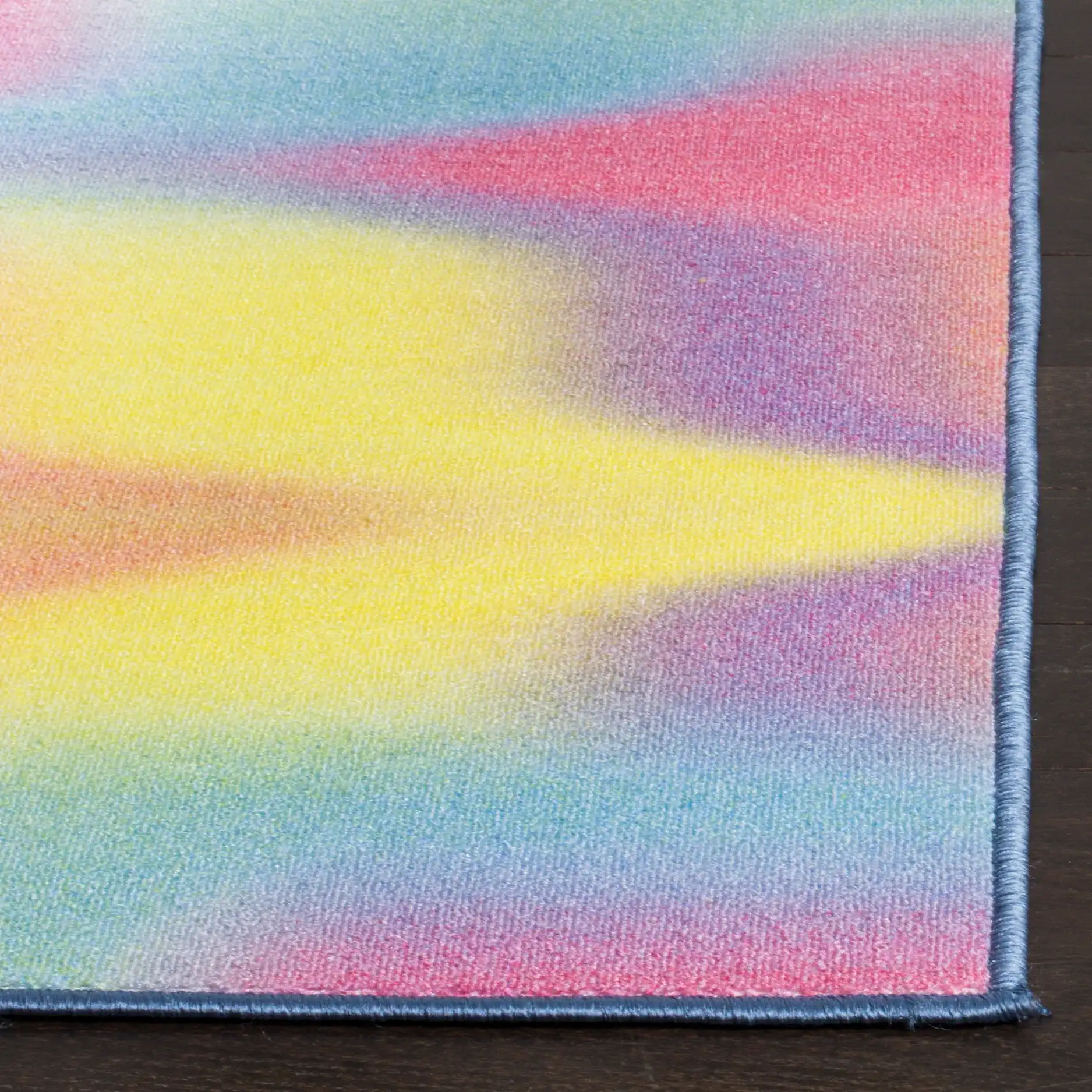 Paint Brush Wavy Stripe Washable Rug in Fuchsia / Yellow in a styled room