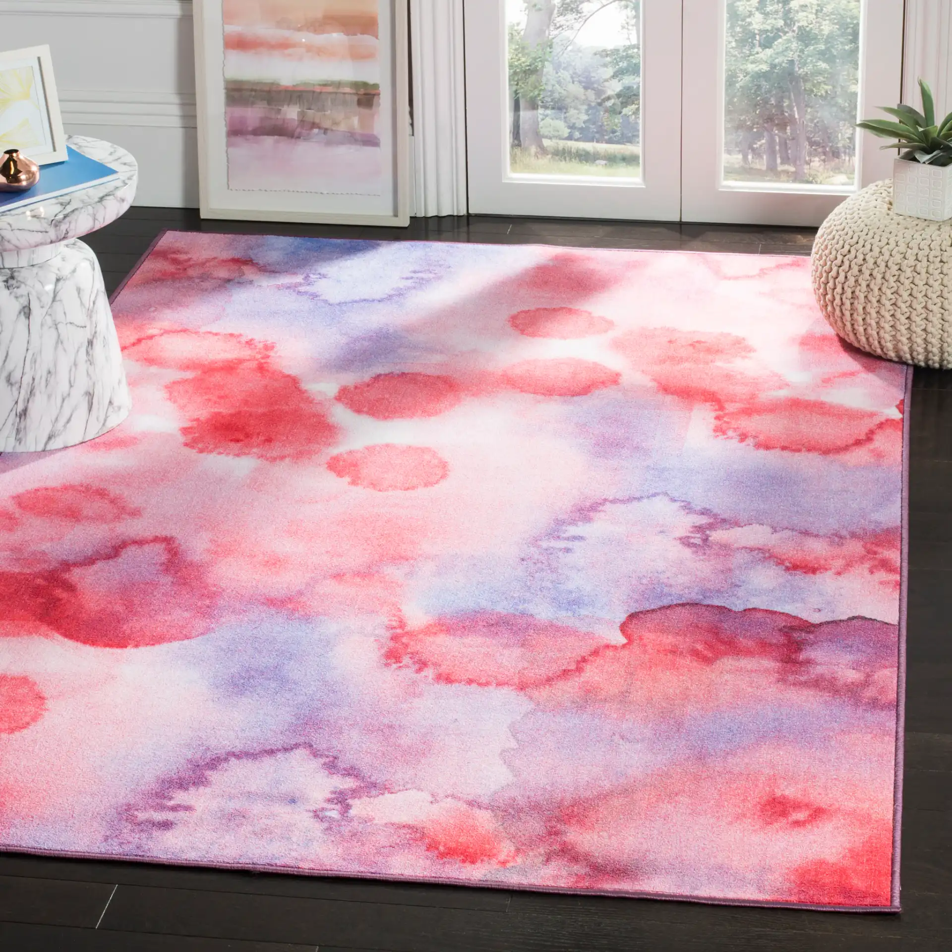 Paint Brush Abstract Washable Rug in Fuchsia / Lavender in a styled room