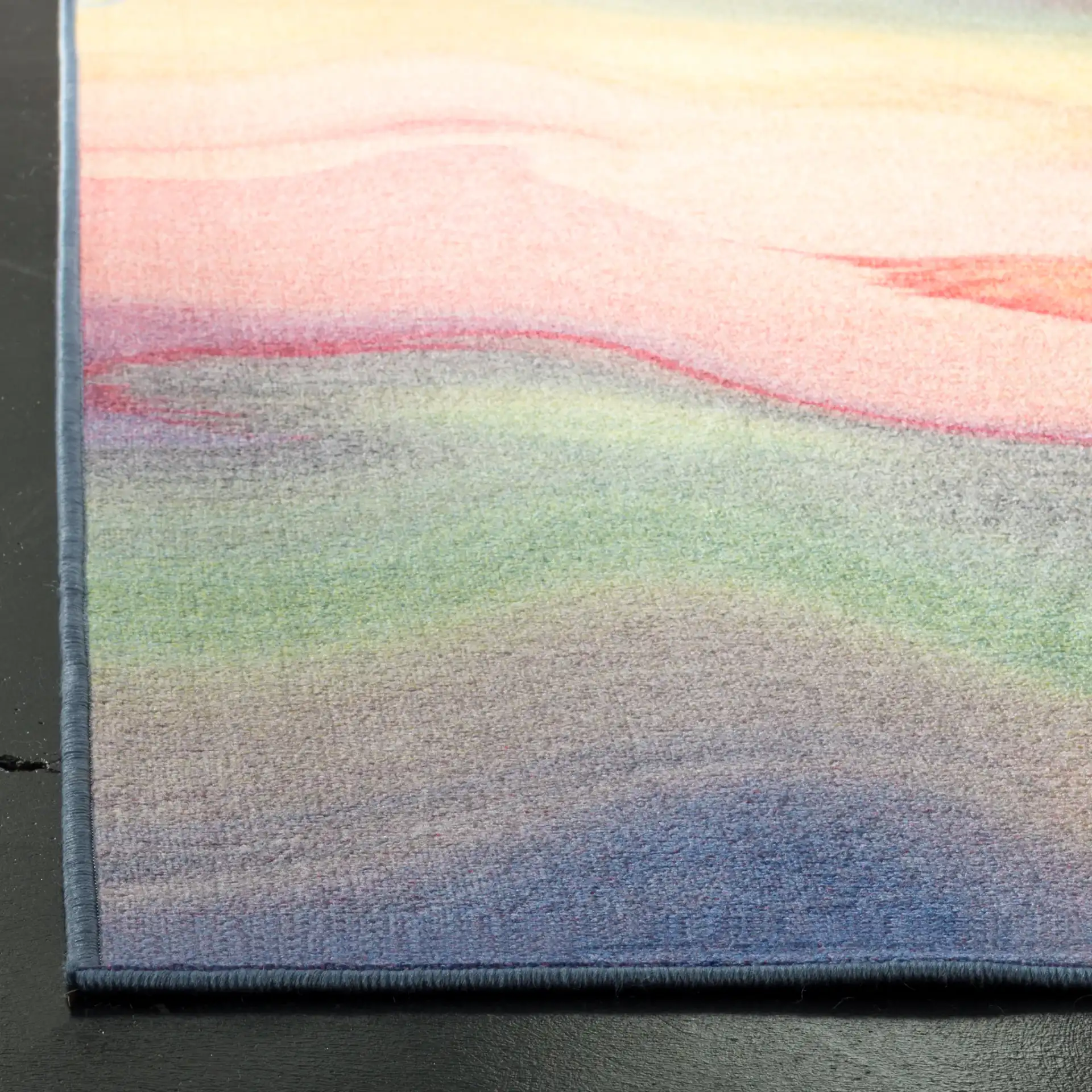Paint Brush Wave Washable Rug in Fuchsia / Yellow in a styled room