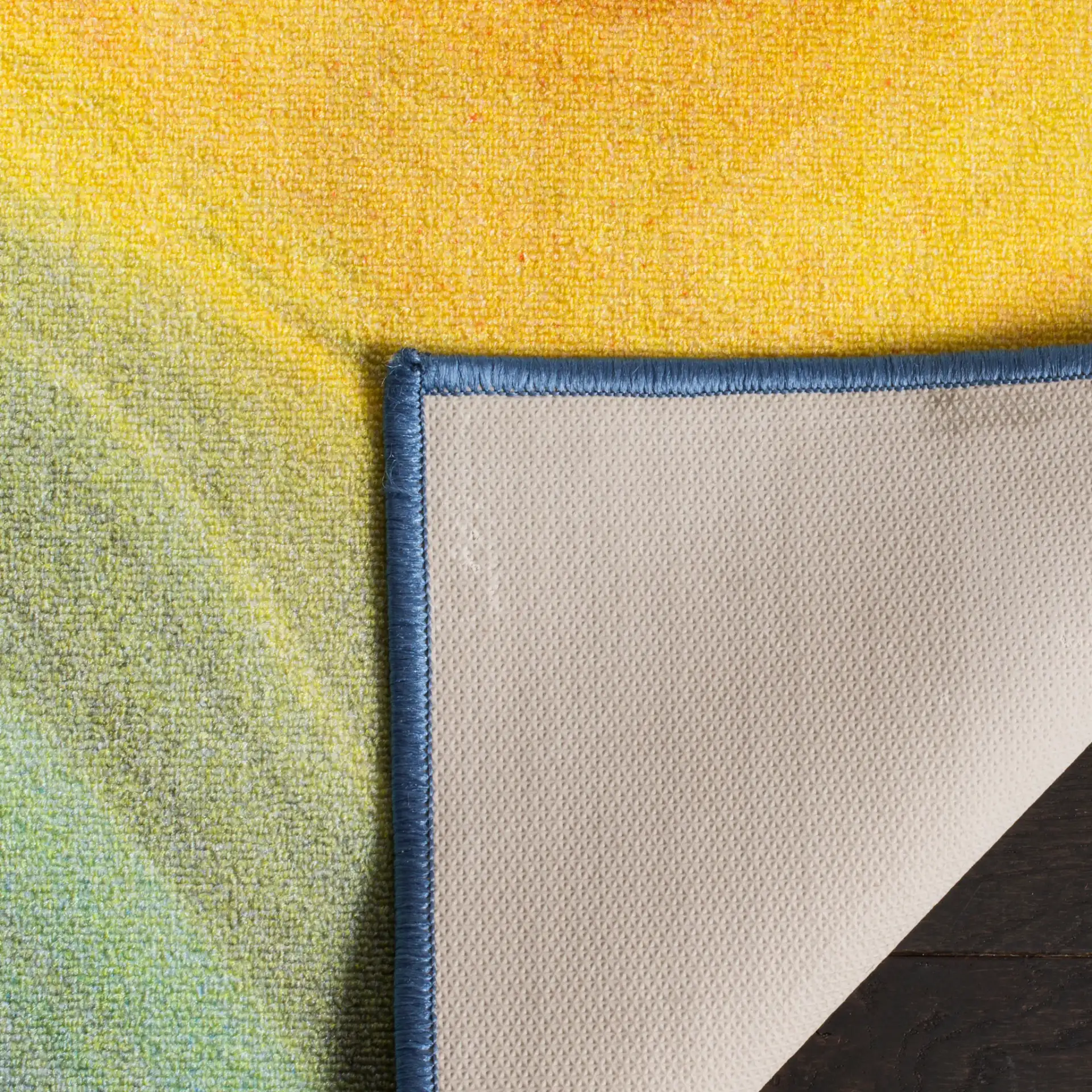 Paint Brush Wave Washable Rug in Fuchsia / Yellow in a styled room