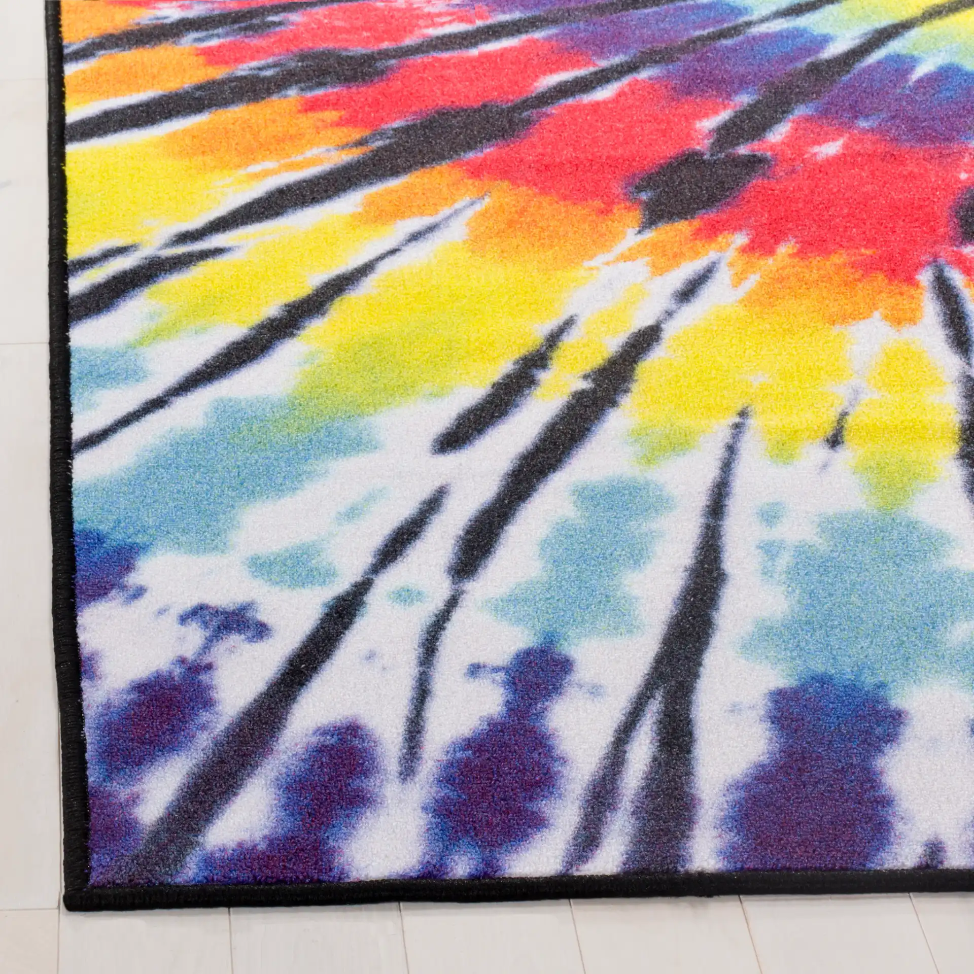 Paint Brush Tie-Dye Washable Rug in Fuchsia / Yellow in a styled room