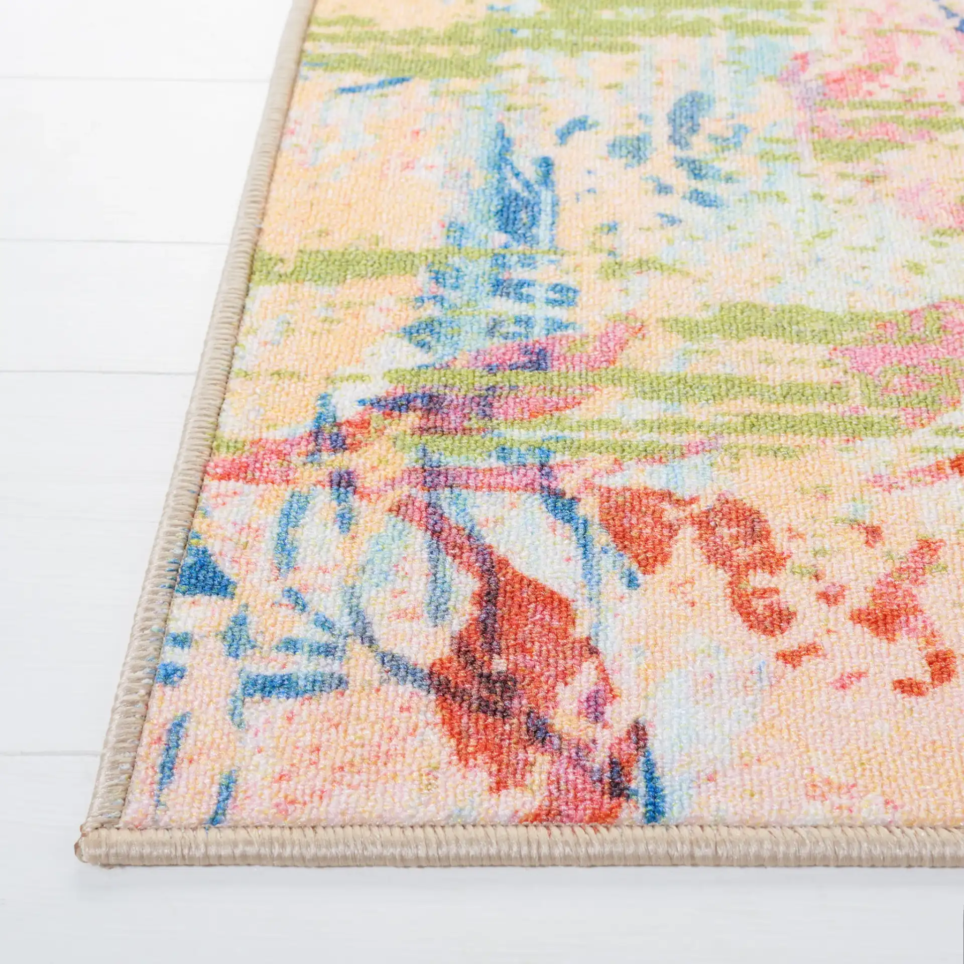 Paint Brush Modern Floral Washable Rug in Blue / Blush Pink in a styled room