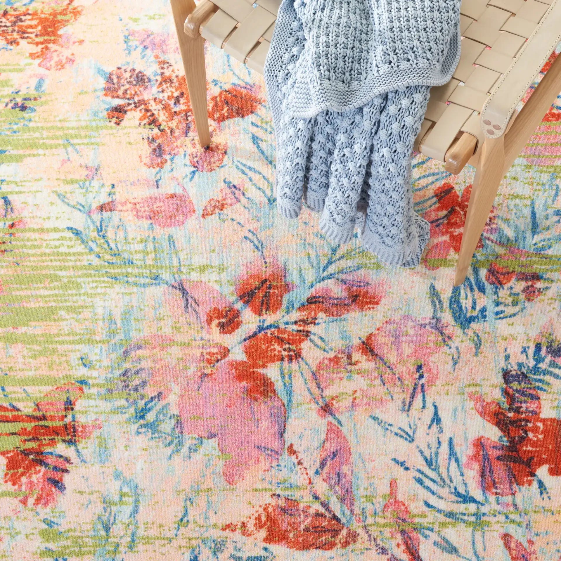Paint Brush Modern Floral Washable Rug in Blue / Blush Pink in a styled room