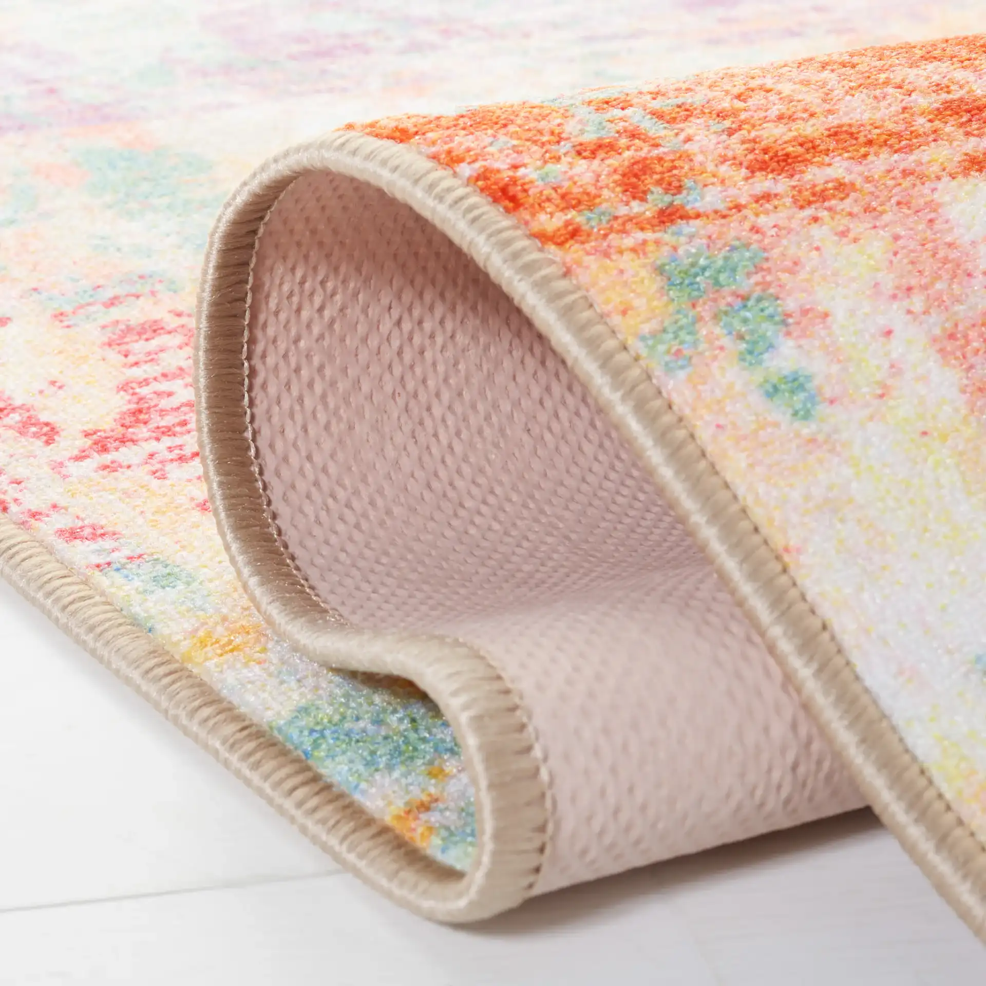 Paint Brush Modern Abstract Washable Rug in Pink / Blue in a styled room