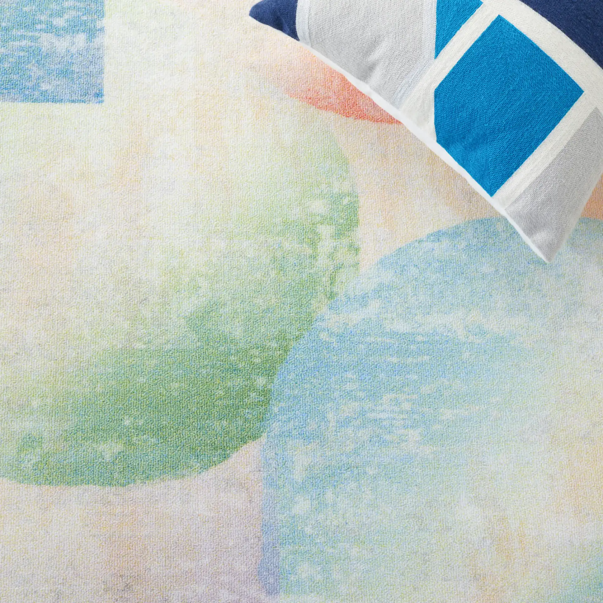 Paint Brush Overlapping Circles Washable Rug in Blue / Purple in a styled room
