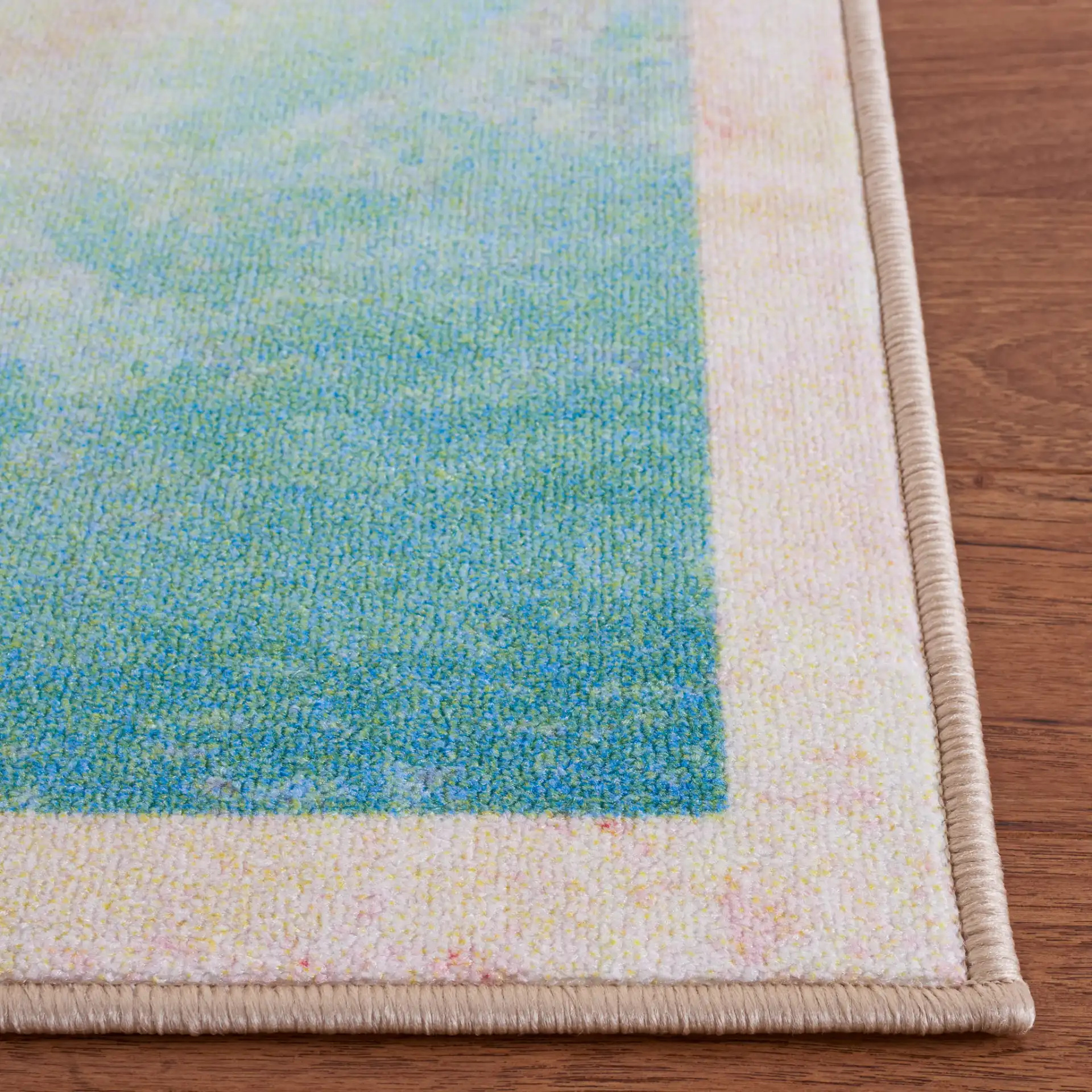 Paint Brush Modern Geometric Washable Rug in Pink / Blue in a styled room