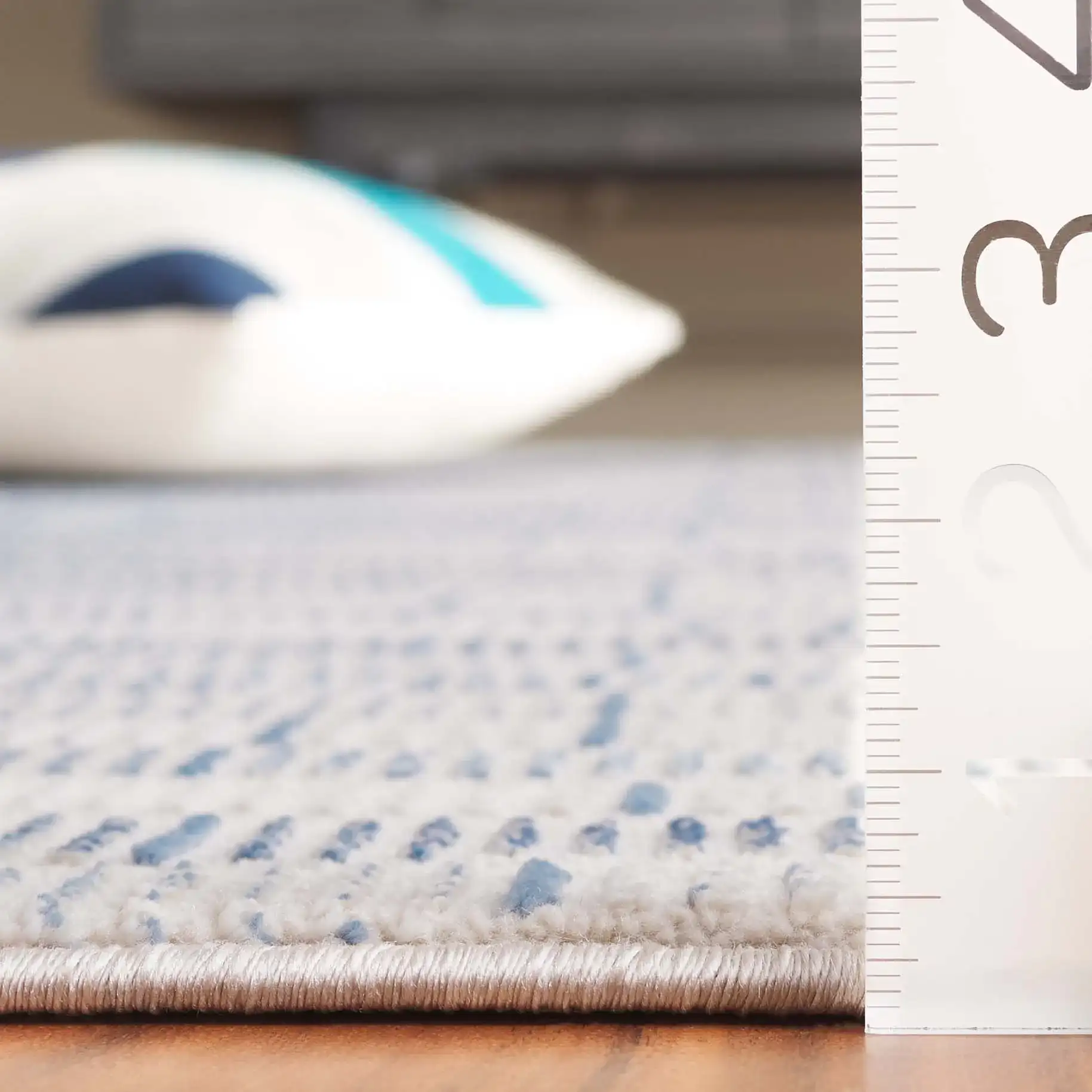 Prestige Dashed Wave Rug in Beige / Blue in a styled room