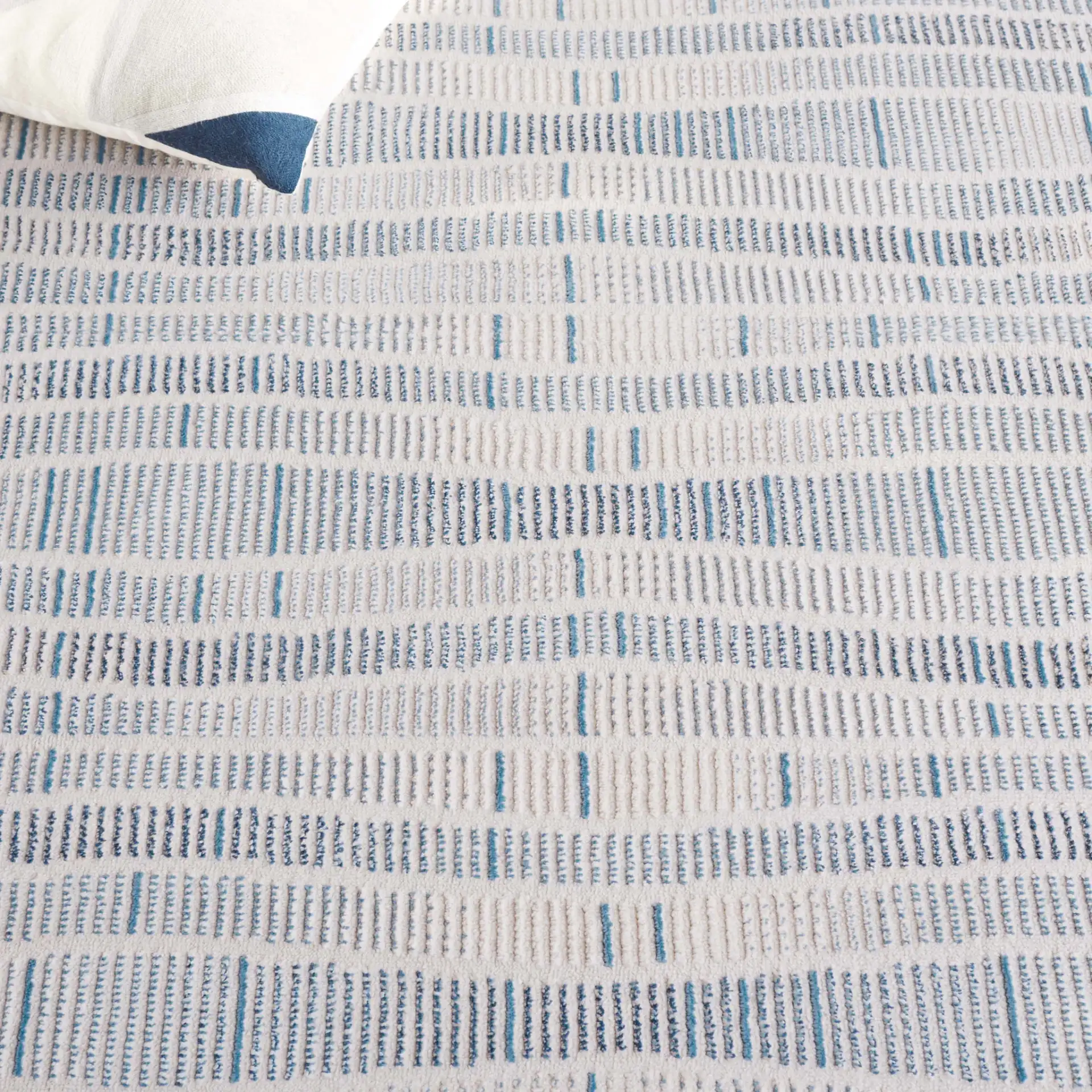 Prestige Dashed Wave Rug in Beige / Blue in a styled room