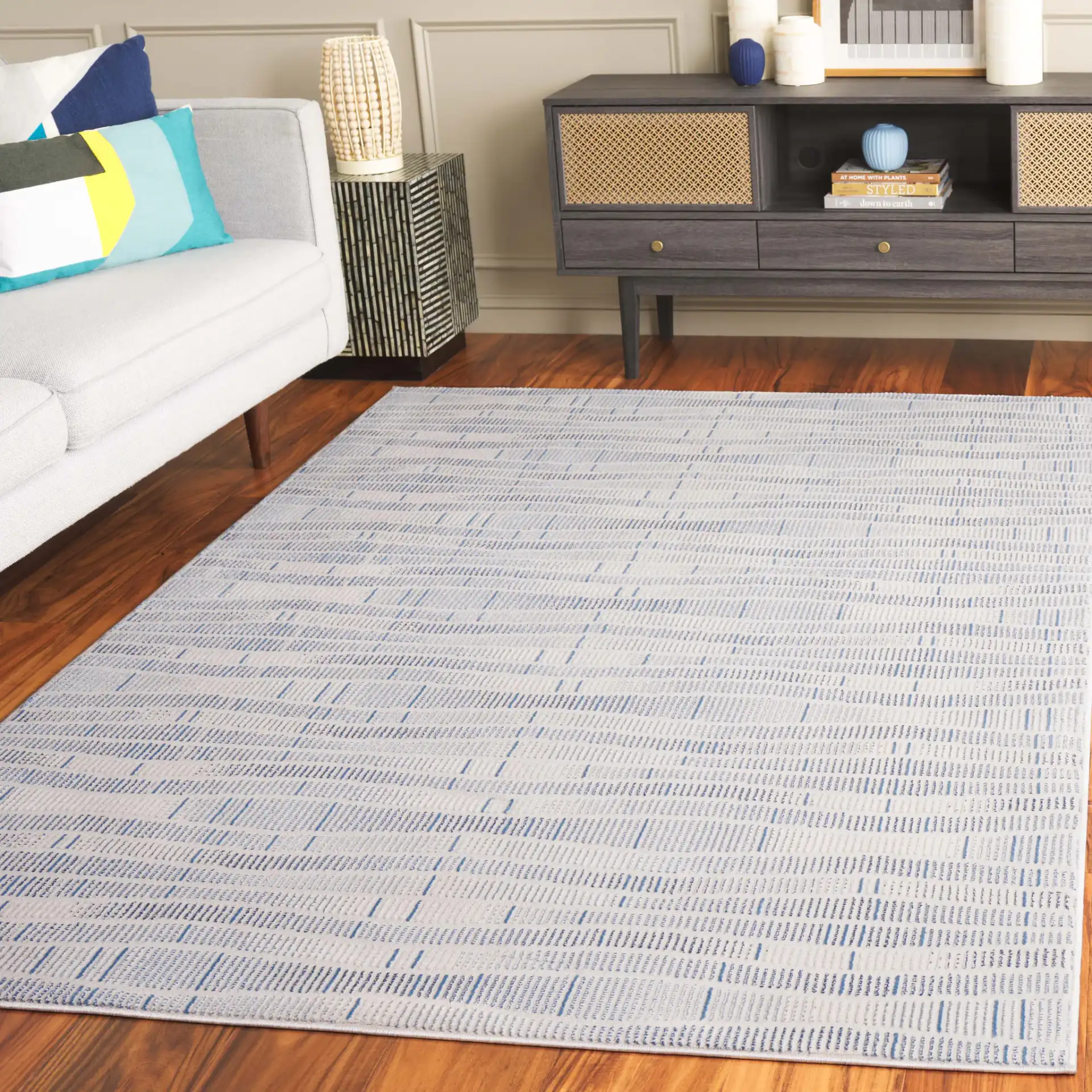 Prestige Dashed Wave Rug in Beige / Blue in a styled room