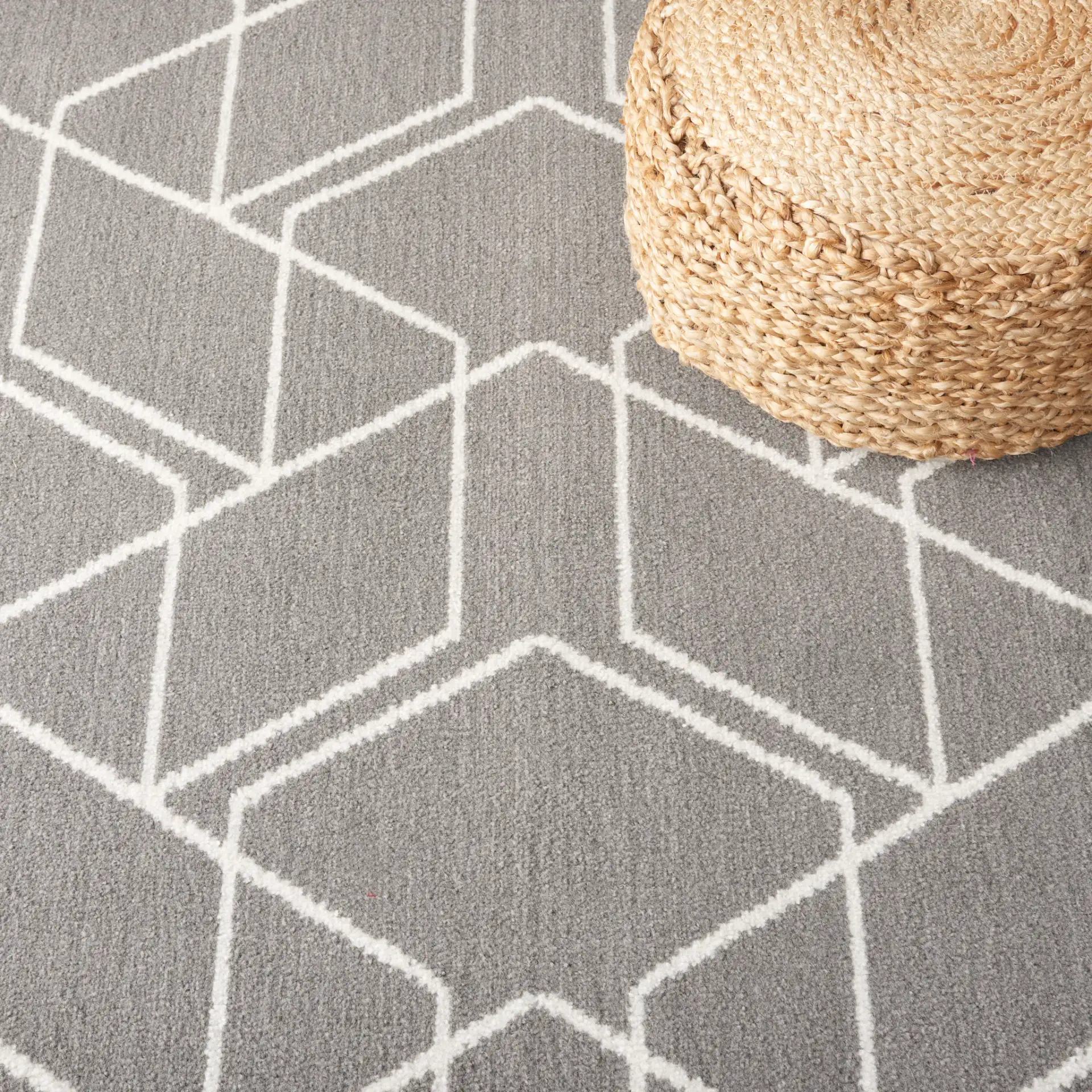 Pyramid Interlocking Cube Rug in Gray / Ivory in a styled room