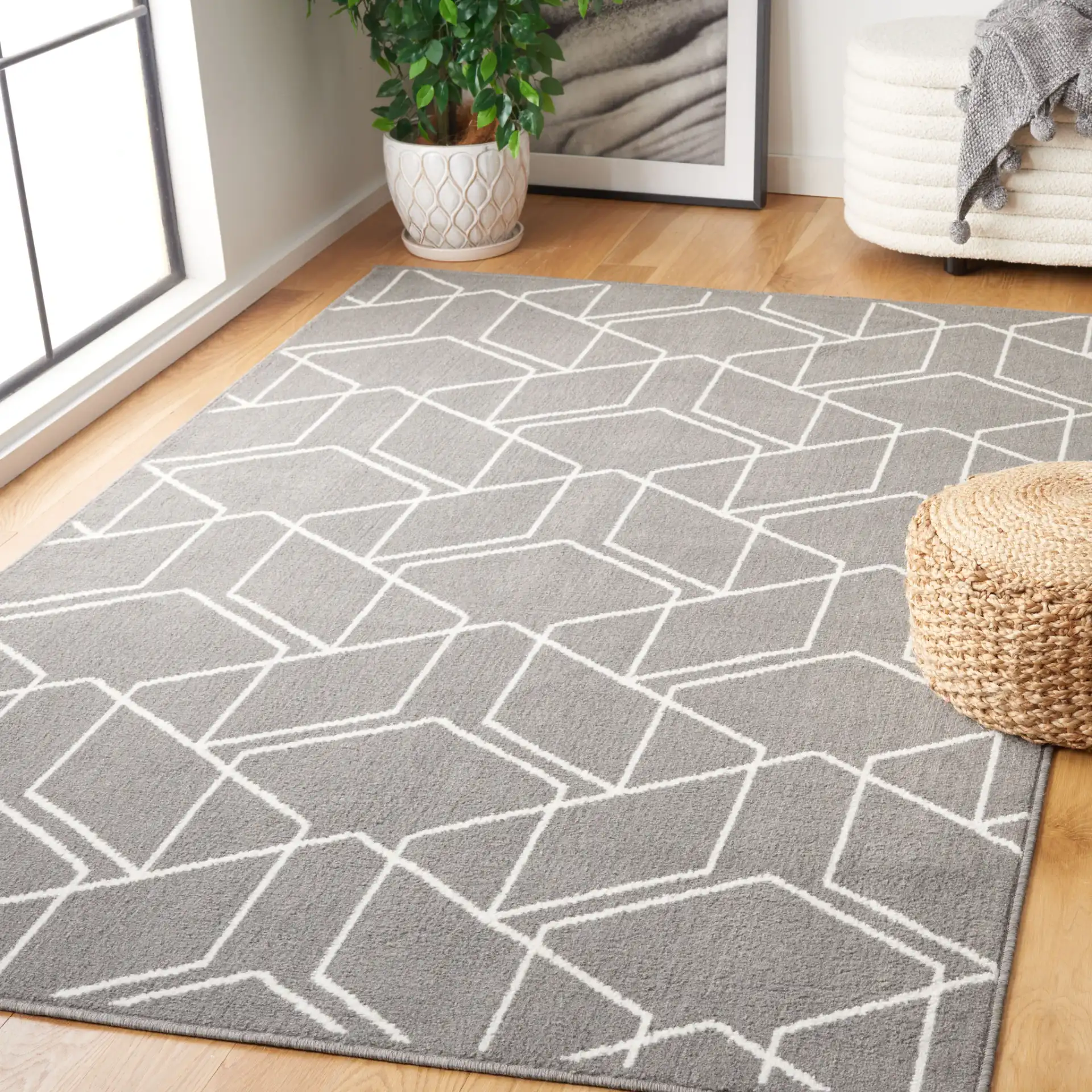 Pyramid Interlocking Cube Rug in Gray / Ivory in a styled room