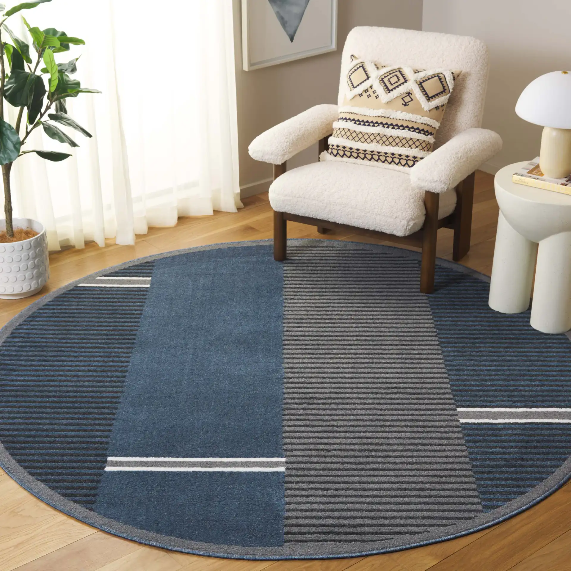 Pyramid Modern Striped Rug in Navy / Gray Black in a styled room