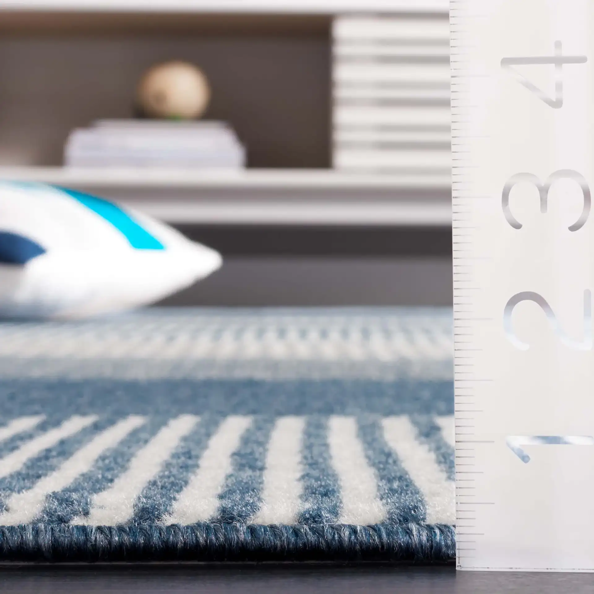 Pyramid Striped Rug in Navy / Ivory in a styled room