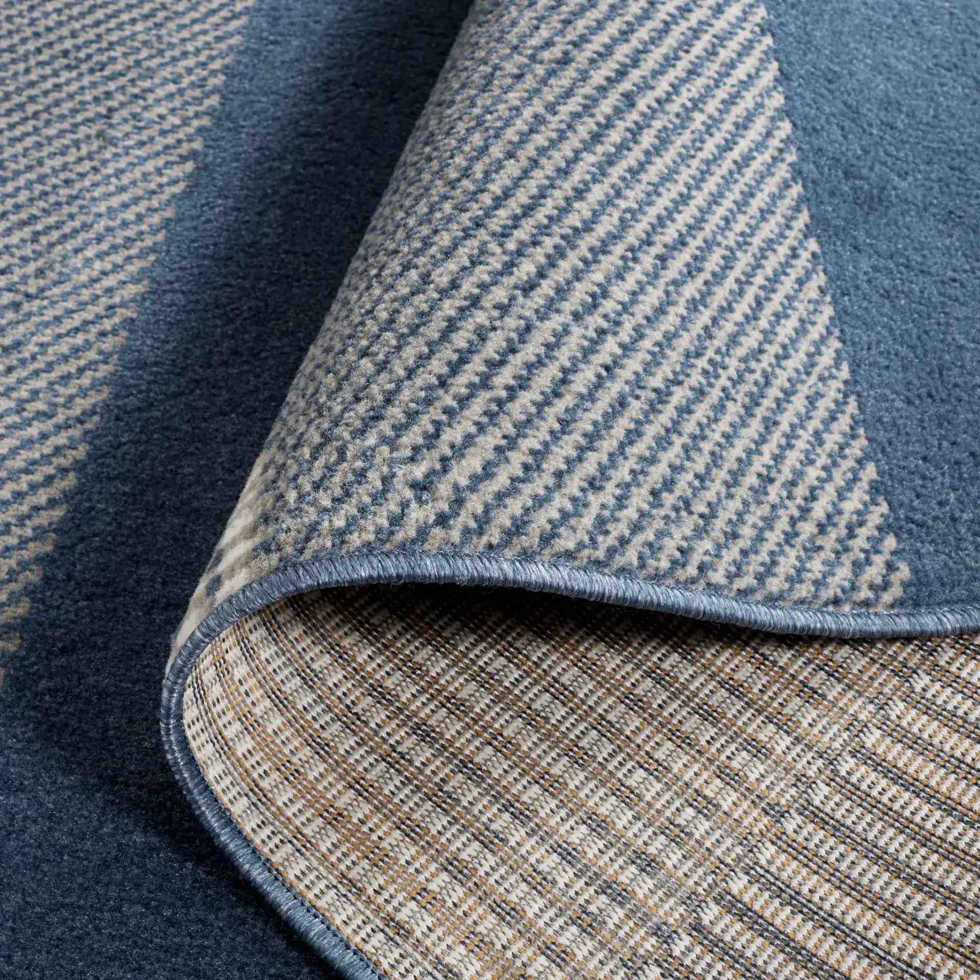Pyramid Striped Rug in Navy / Ivory in a styled room