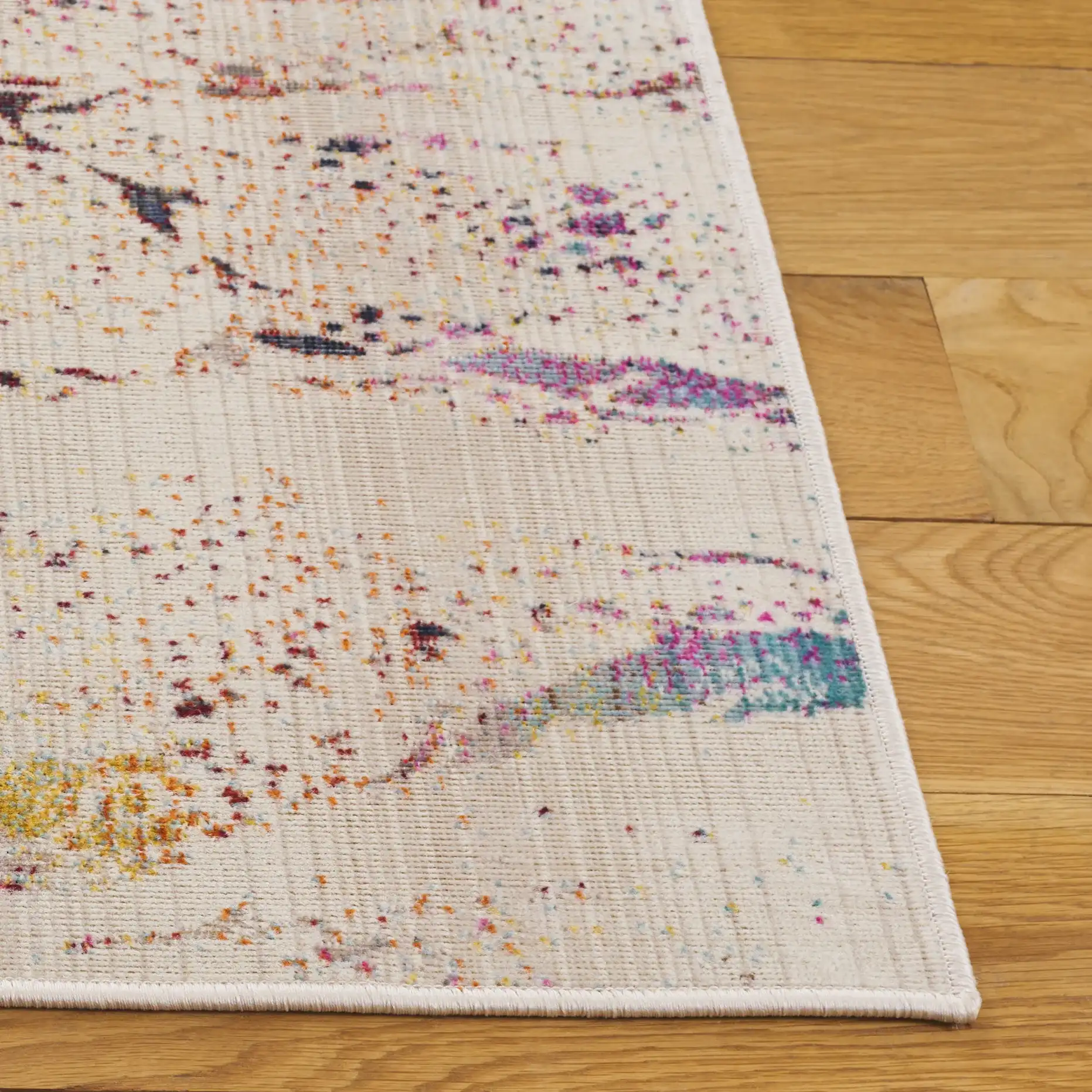 Rainbow Marbled Outdoor Rug in Ivory / Blue Gold in a styled room
