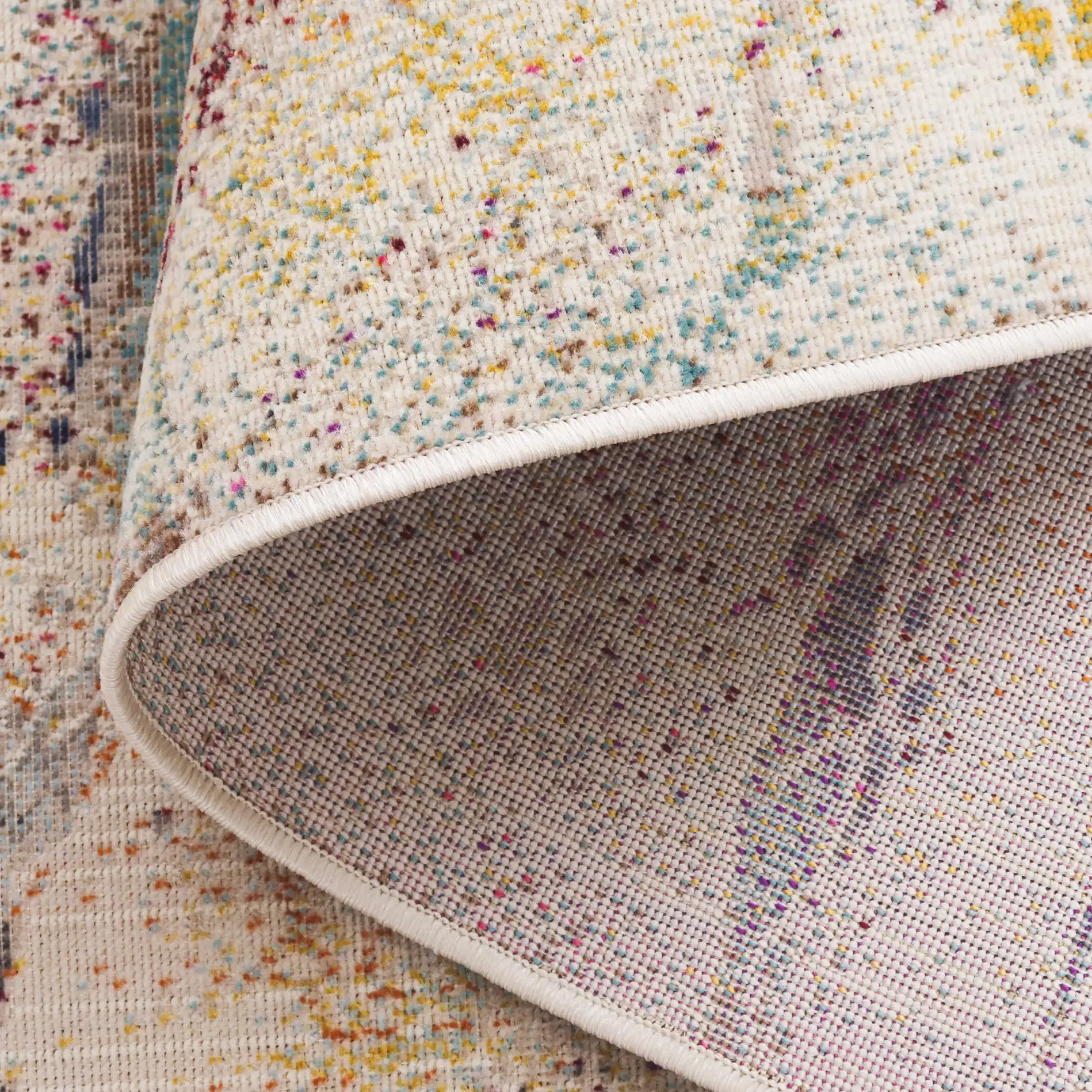 Rainbow Marbled Outdoor Rug in Ivory / Blue Gold in a styled room