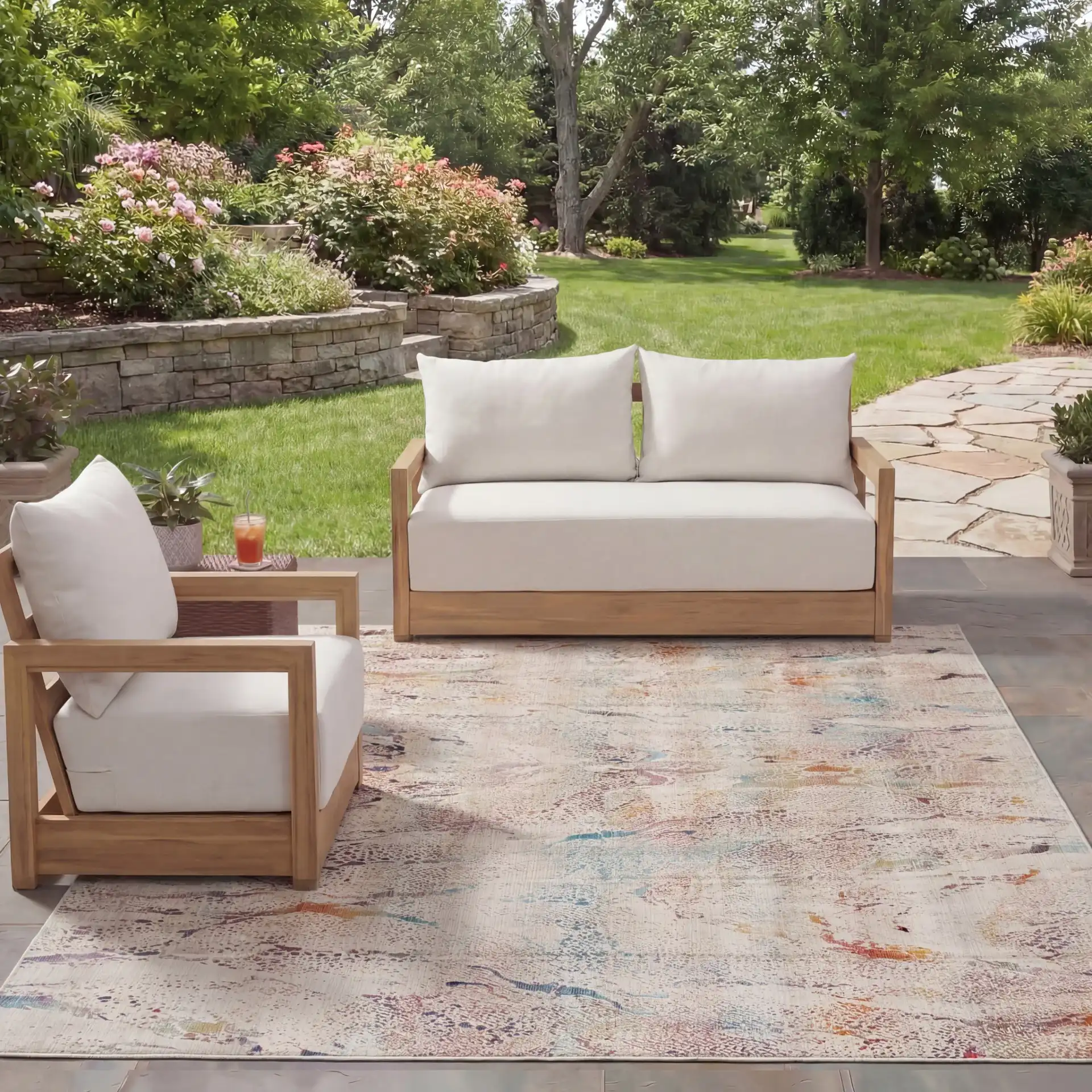 Rainbow Marbled Outdoor Rug in Ivory / Blue Gold in a styled room