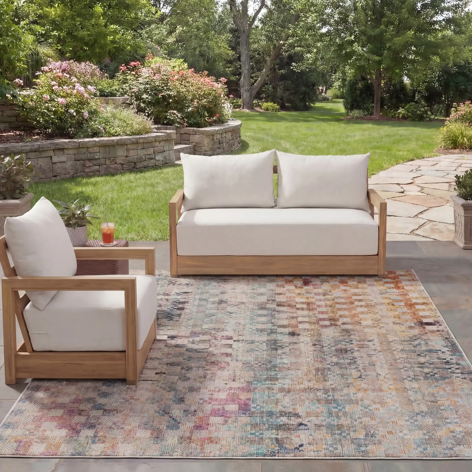 Rainbow Patchwork Grid Outdoor Rug in Blue / Gold in a styled room