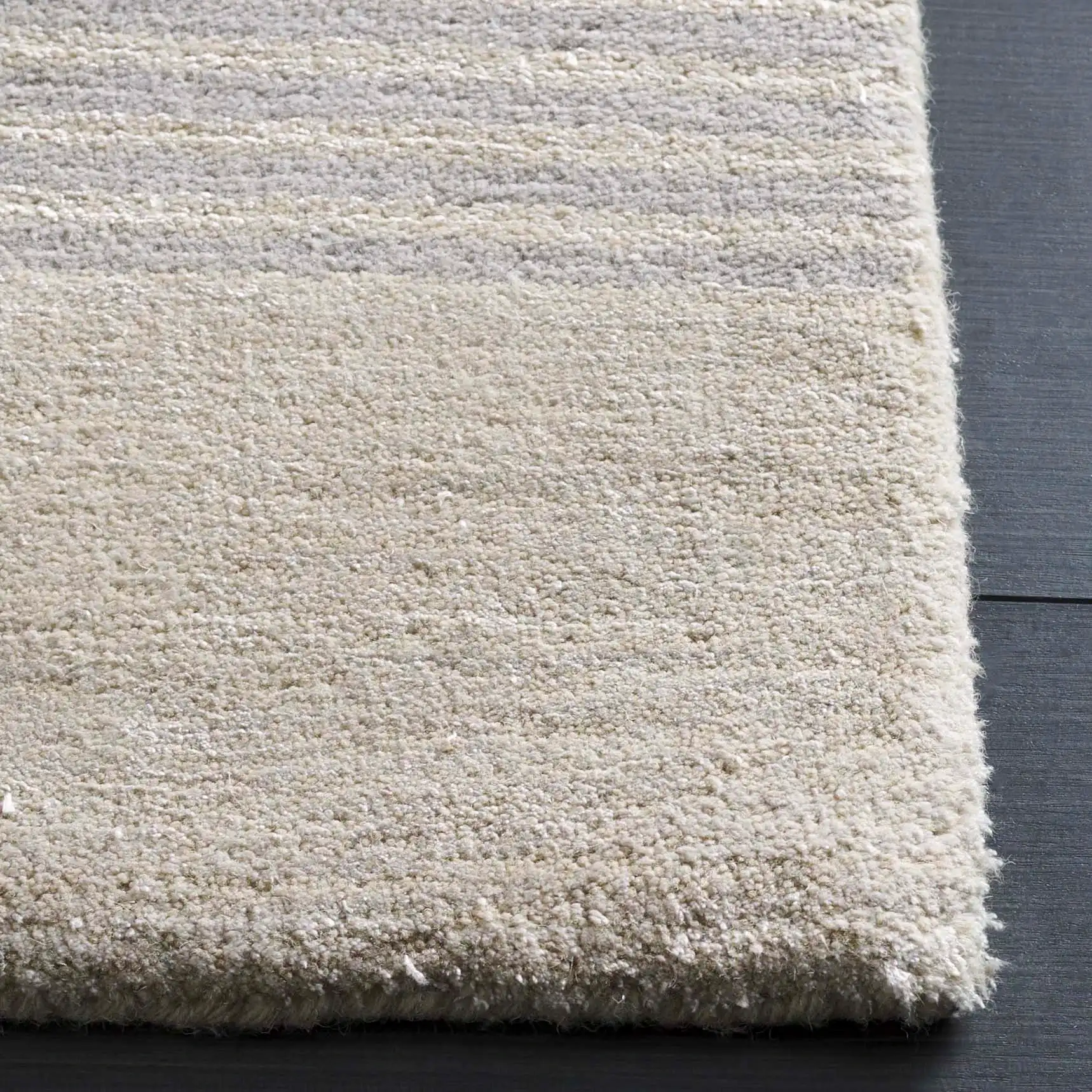Rodeo Drive Abstract Block Hand-Tufted Wool Rug in Navy / Ivory in a styled room