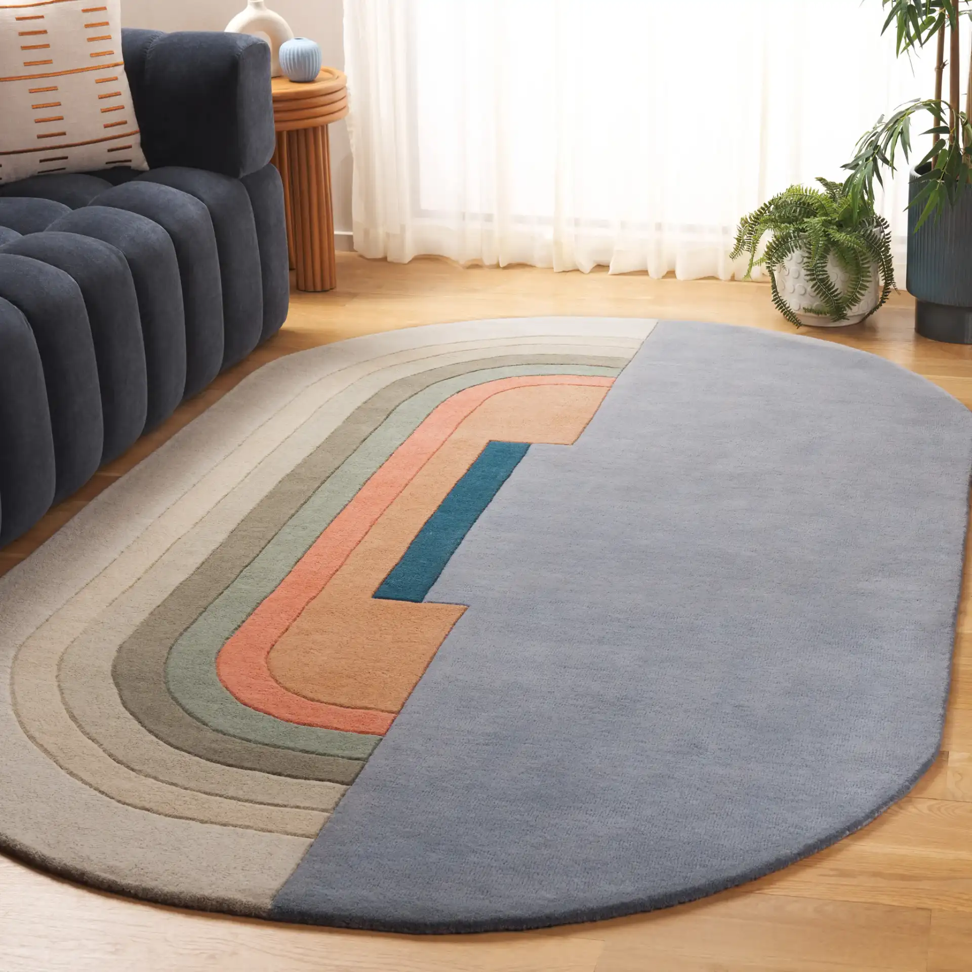 Rodeo Drive Concentric Arch Hand-Tufted Wool Rug in Blue / Ivory in a styled room
