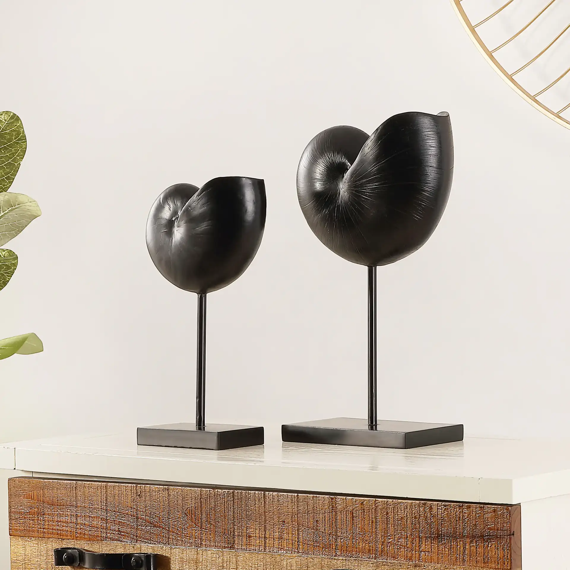 Resi Snail Table Decor (Set Of 2) in Black in a styled room