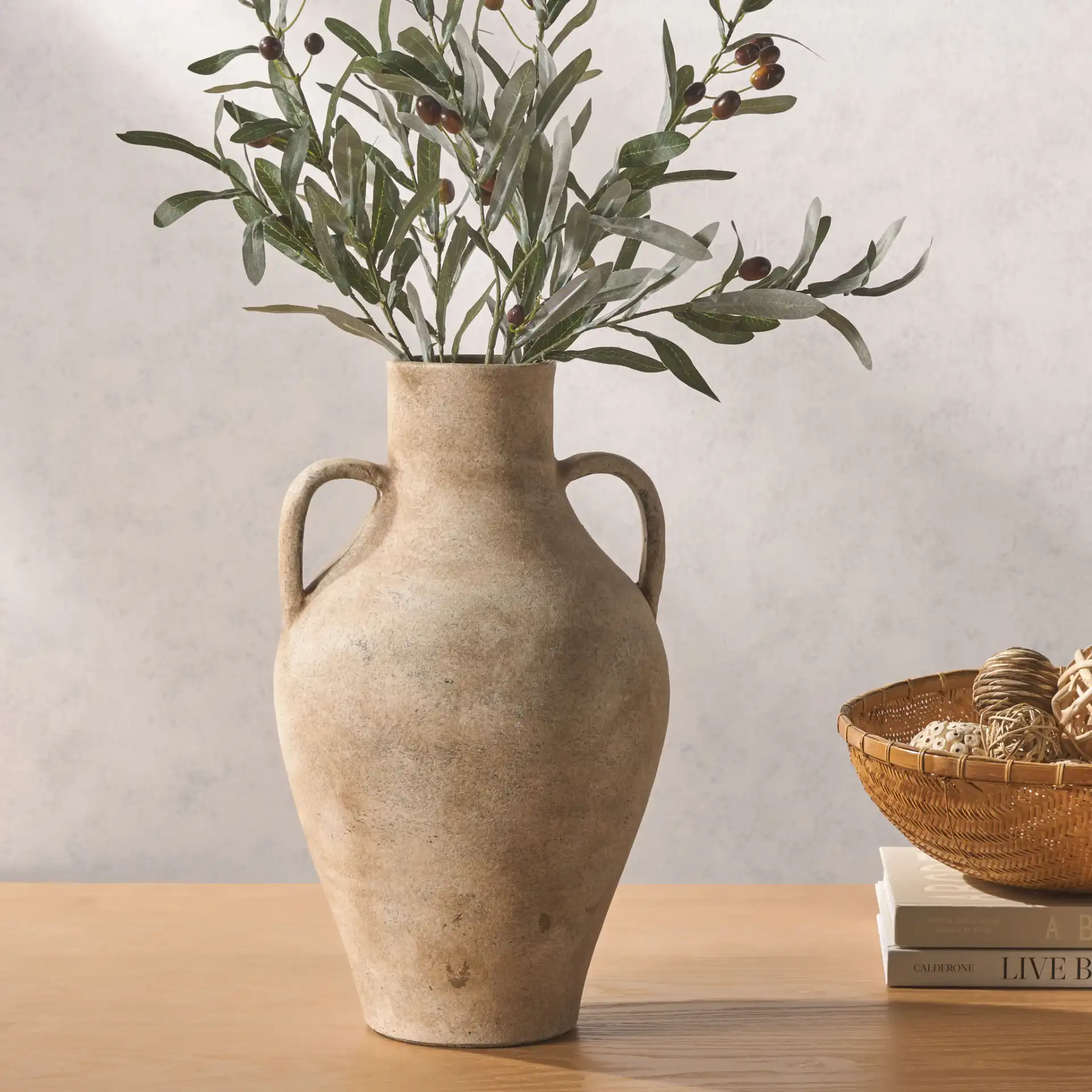Mesa Stoneware Vase in Black in a styled room