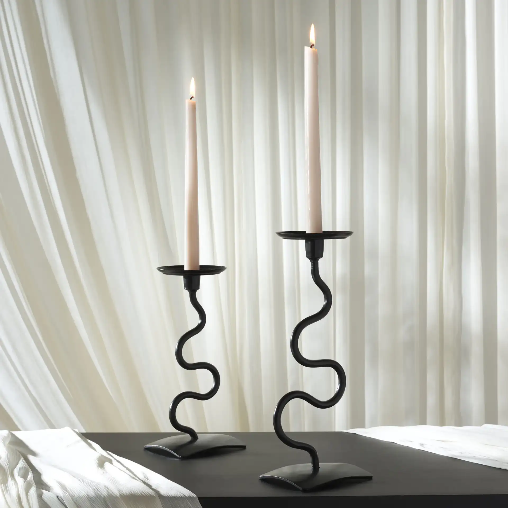 Nisi Candlestick (Set Of 2) in Black in a styled room
