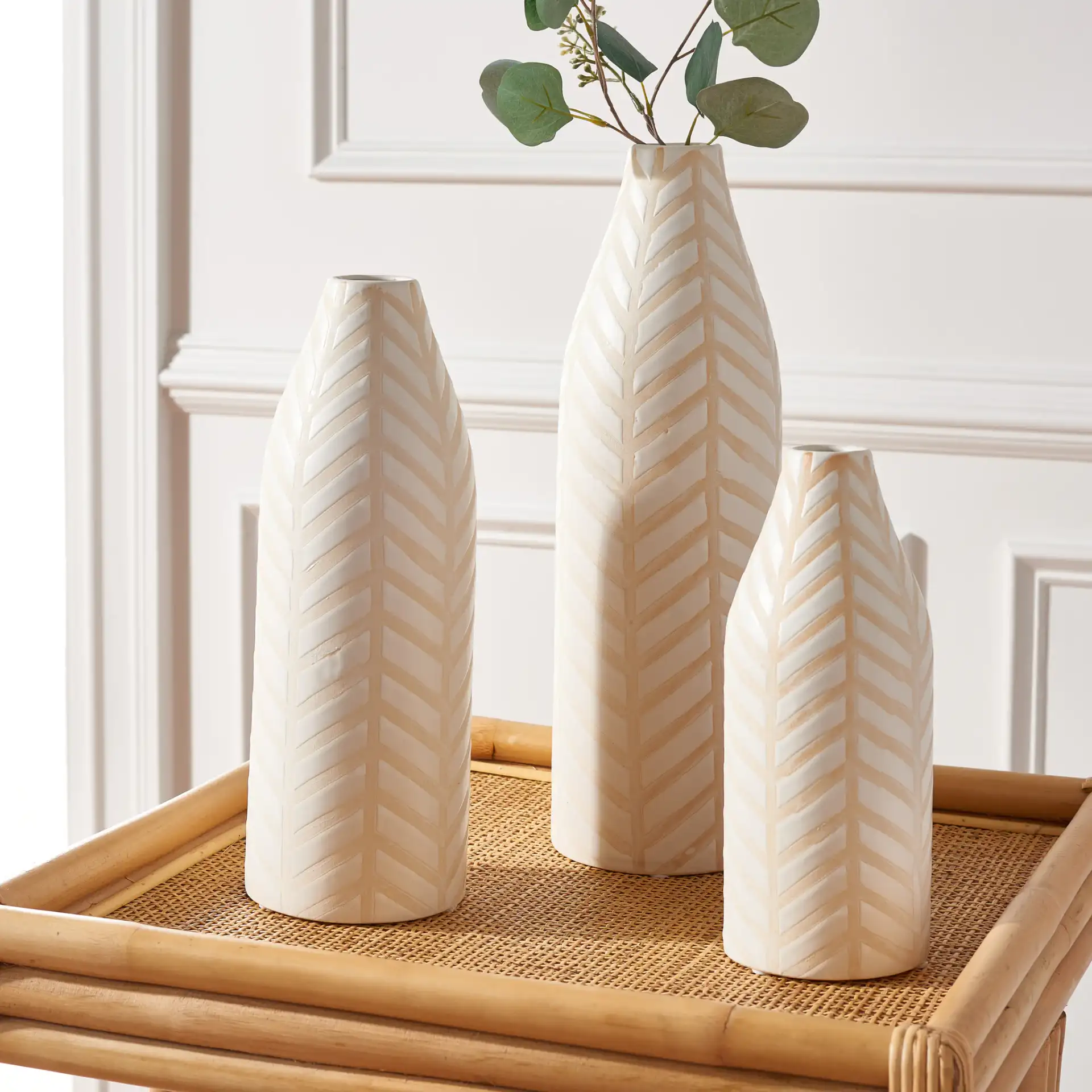 Lovetta Ceramic Vase (Set Of 3) in Cream in a styled room