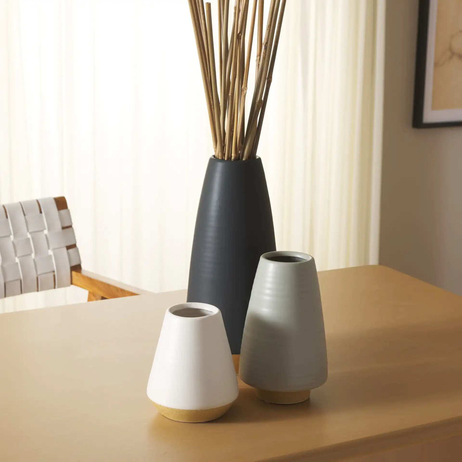 Joetta Ceramic Vase (Set Of 3) in Assorted in a styled room
