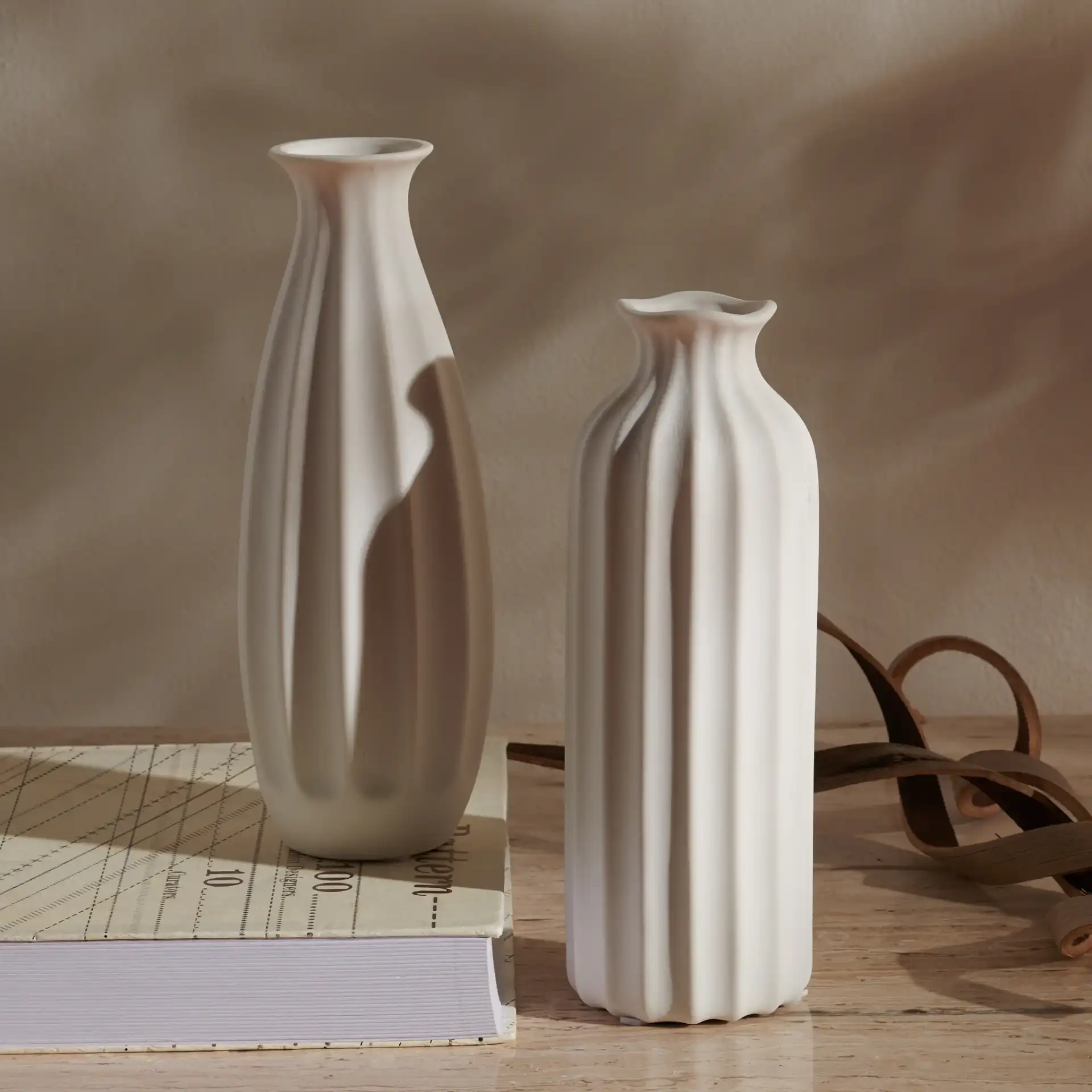 Ilsa Ceramic Vase (Set Of 2) in White in a styled room