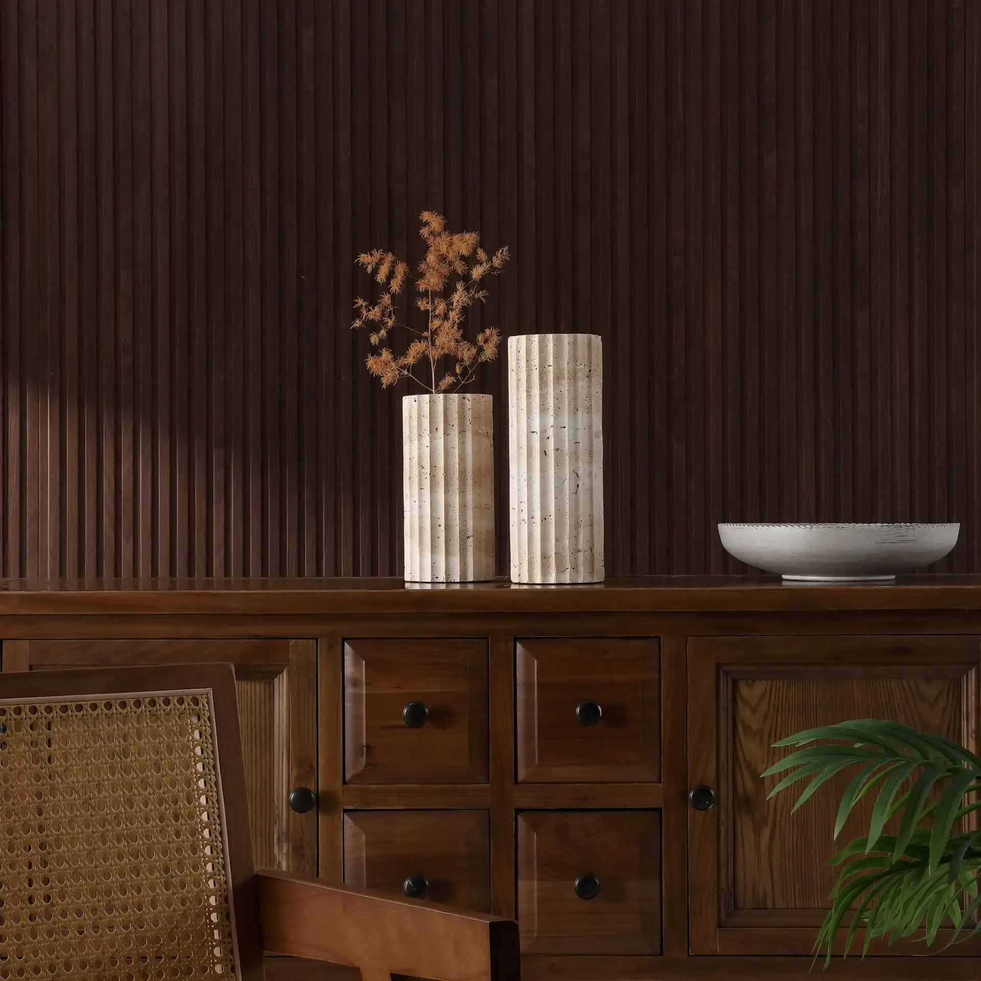 Teroi Travertine Vases (Set Of 2) in Sand in a styled room