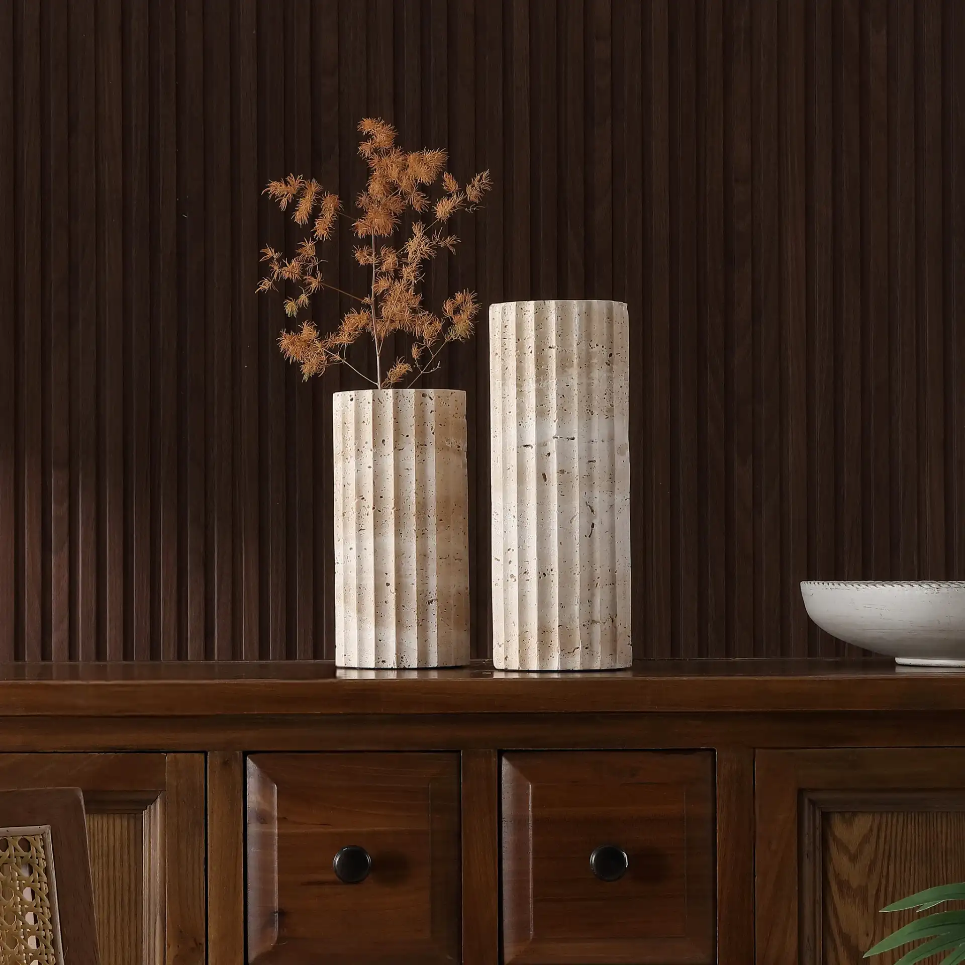 Teroi Travertine Vases (Set Of 2) in Sand in a styled room