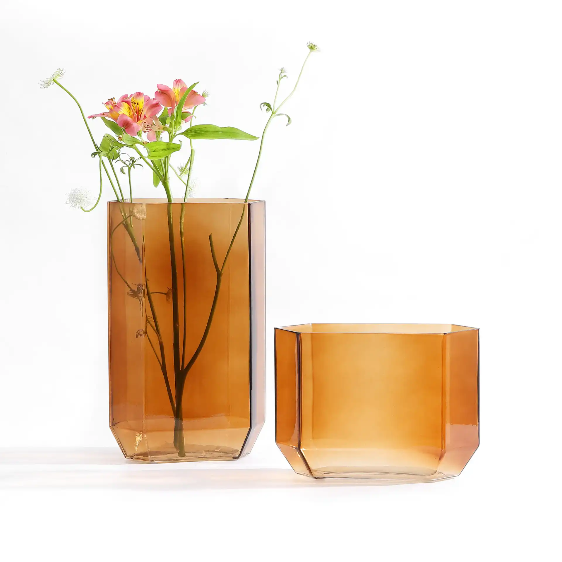 Noreno Glass Vase (Set Of 2) in Light Orange in a styled room