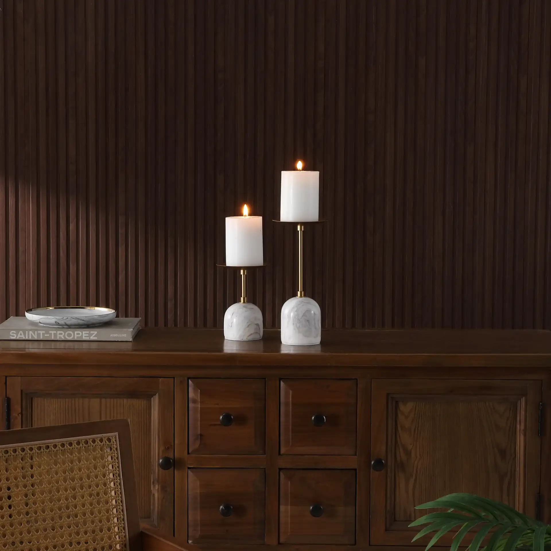 Hara Candle Holder (Set Of 2) in White / Gold in a styled room