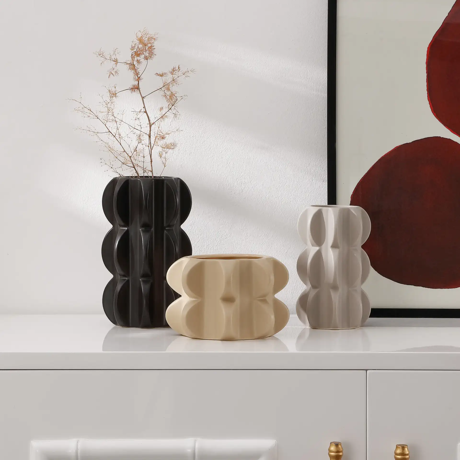 Felix Ceramic Vase Set Of Three in Multi in a styled room