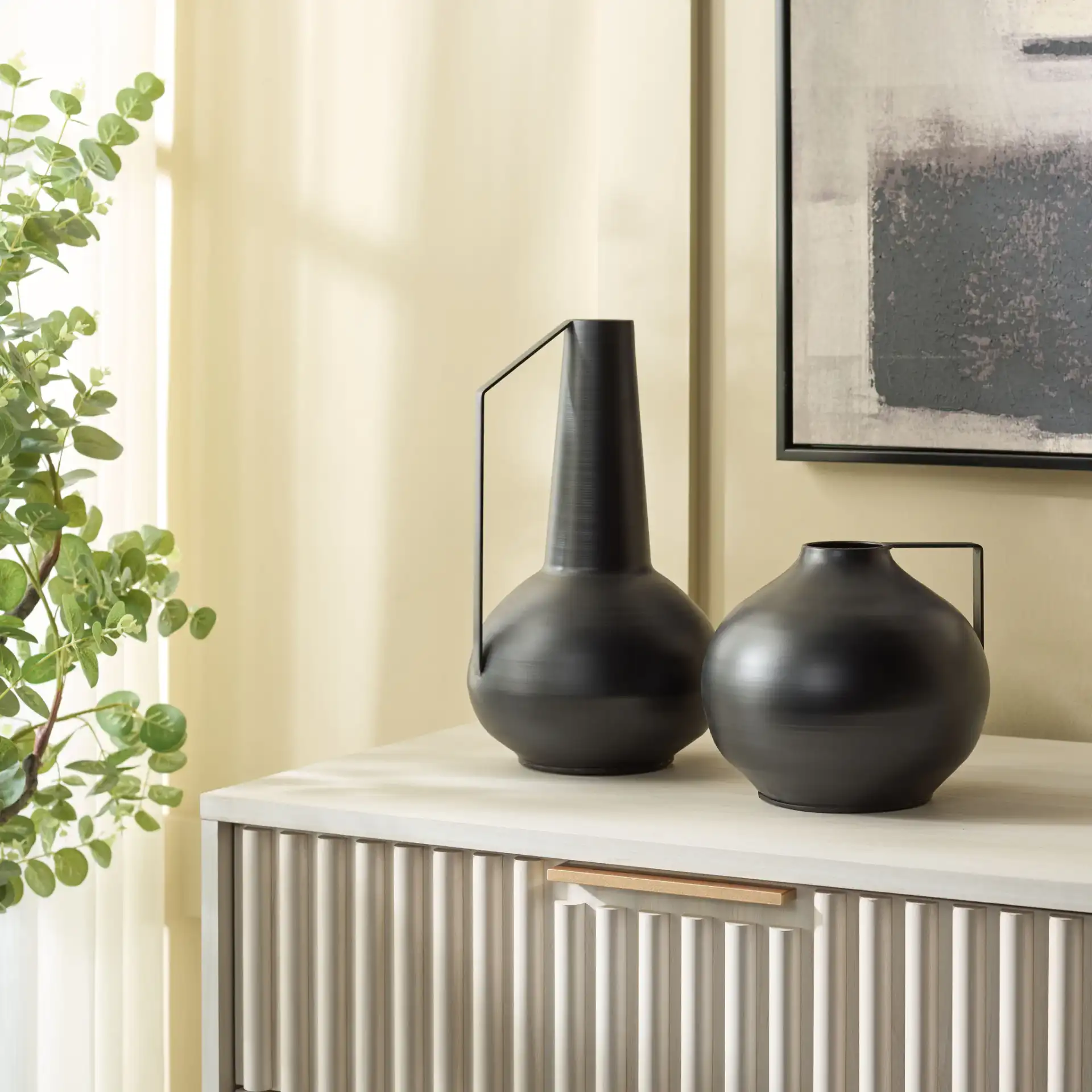 Luca Iron Vase (Set Of 2) in Black in a styled room