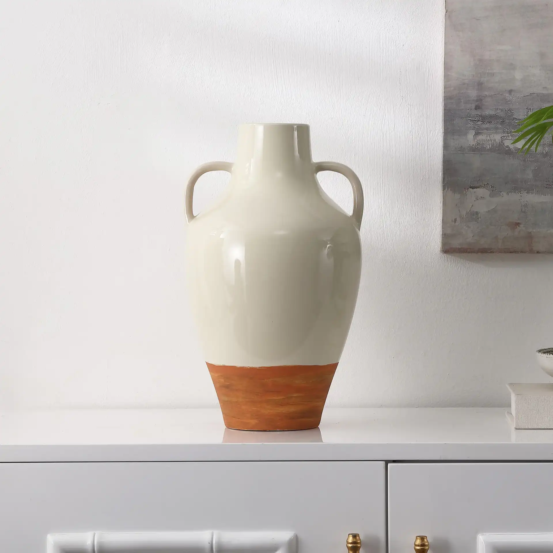 Athena 18-Inch Ceramic Handle Vase in Ivory / Light Brown in a styled room