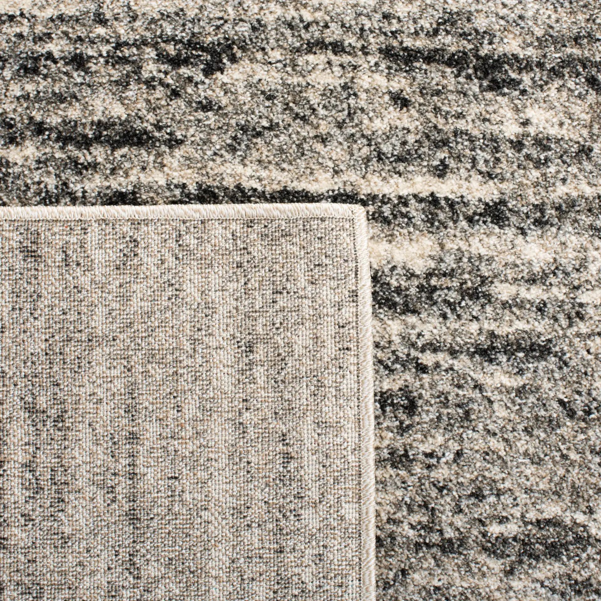 Retro Linear Rug in Ivory / Gray in a styled room