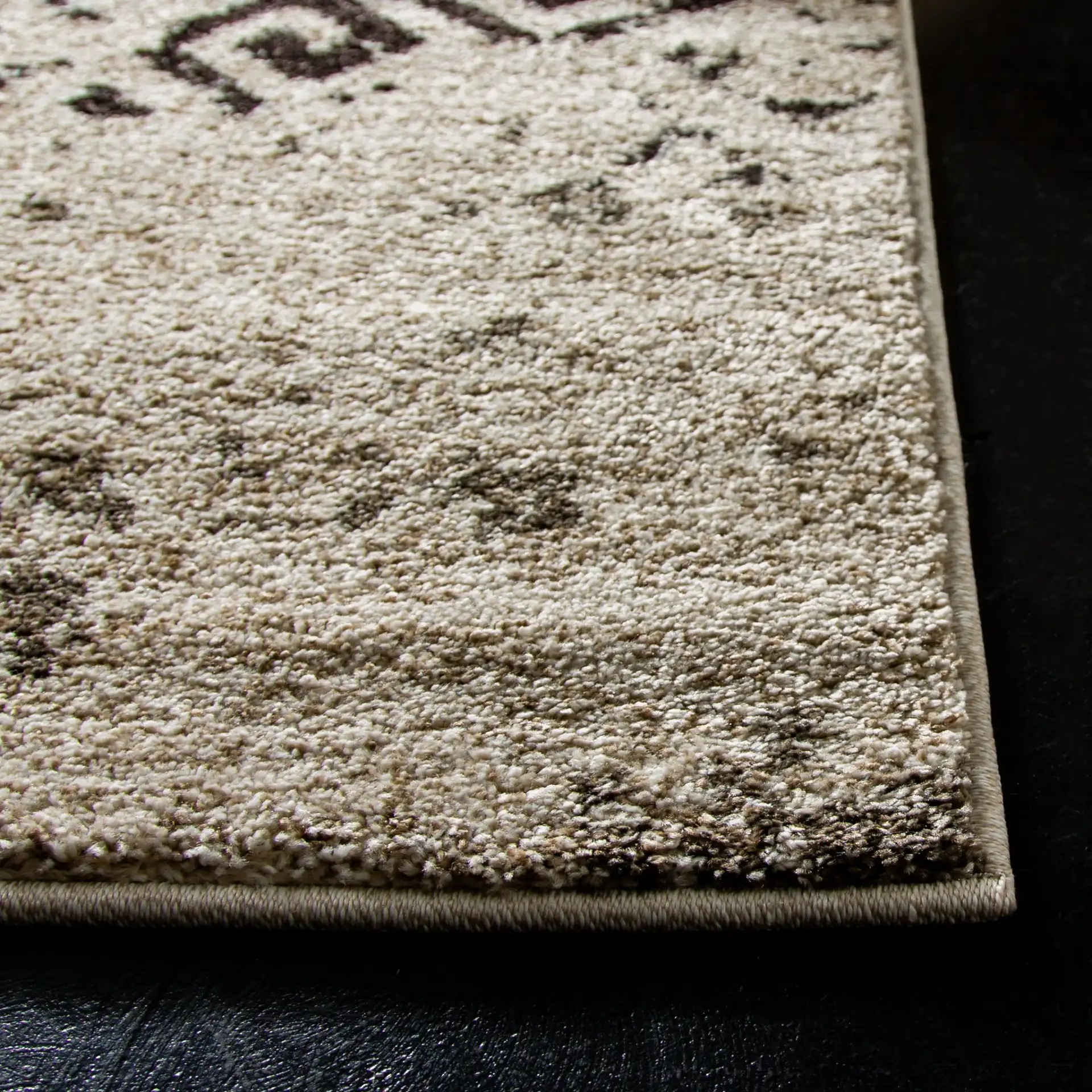 Retro Modern Patchwork Geometric Rug in Cream / Brown in a styled room