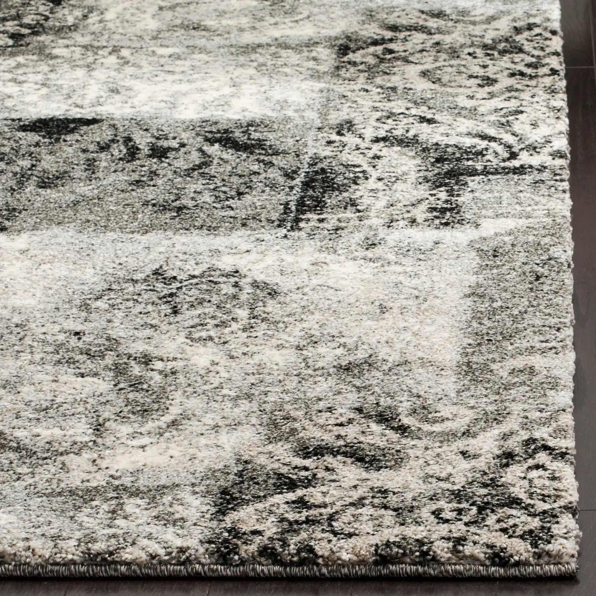 Retro Patchwork Damask Rug in Cream / Gray in a styled room