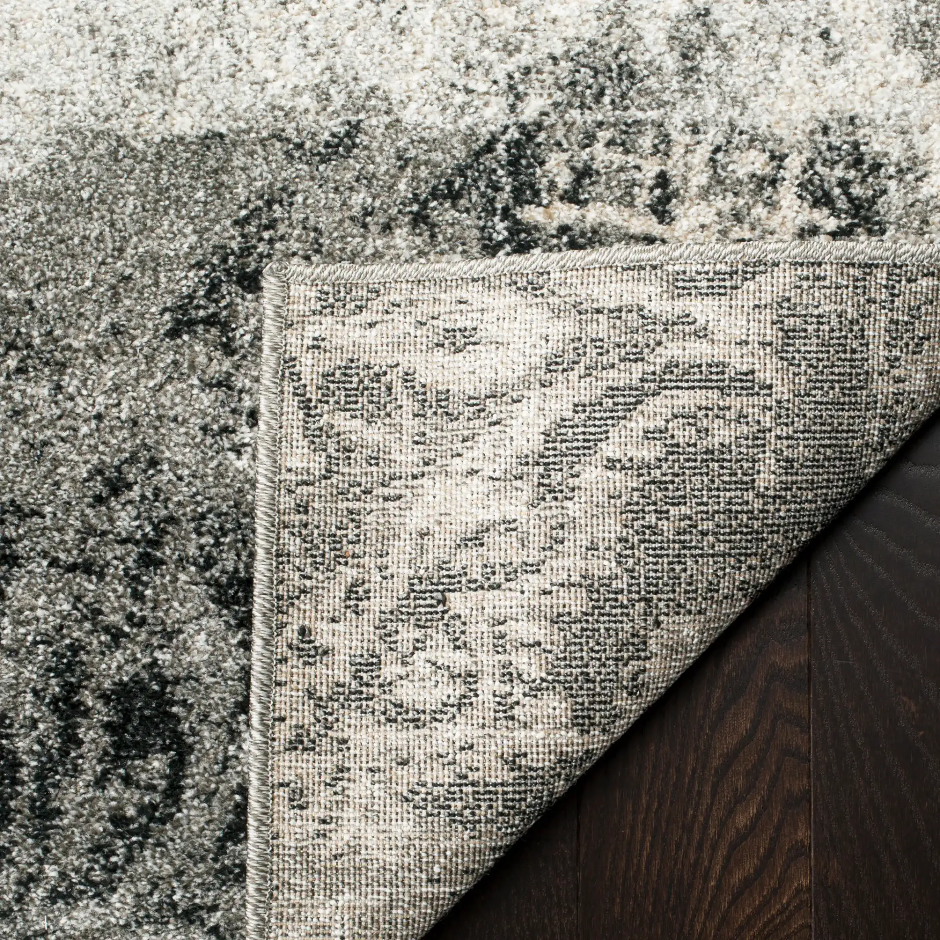 Retro Patchwork Damask Rug in Cream / Gray in a styled room
