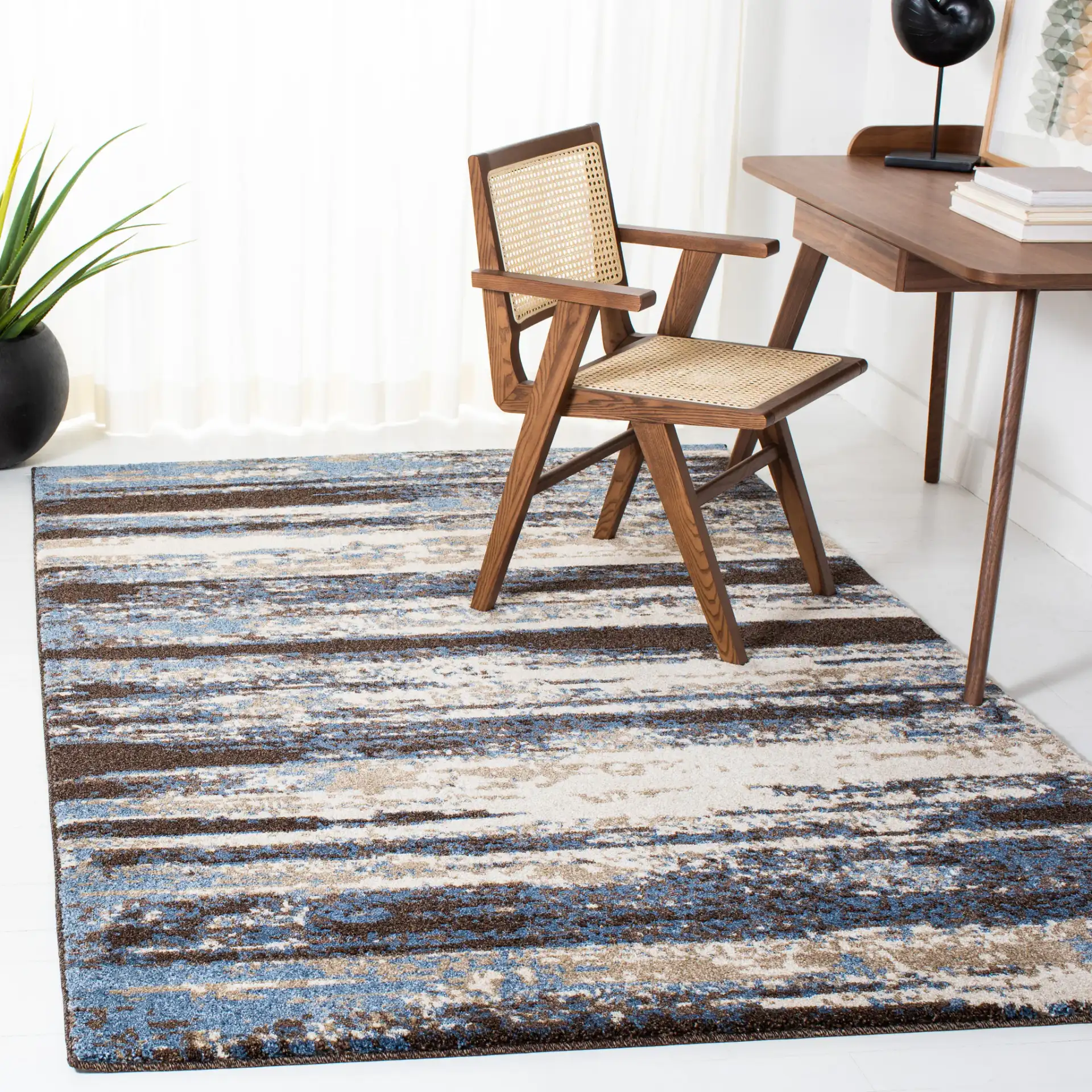 Retro Abstract Stripe Rug in Cream / Blue in a styled room