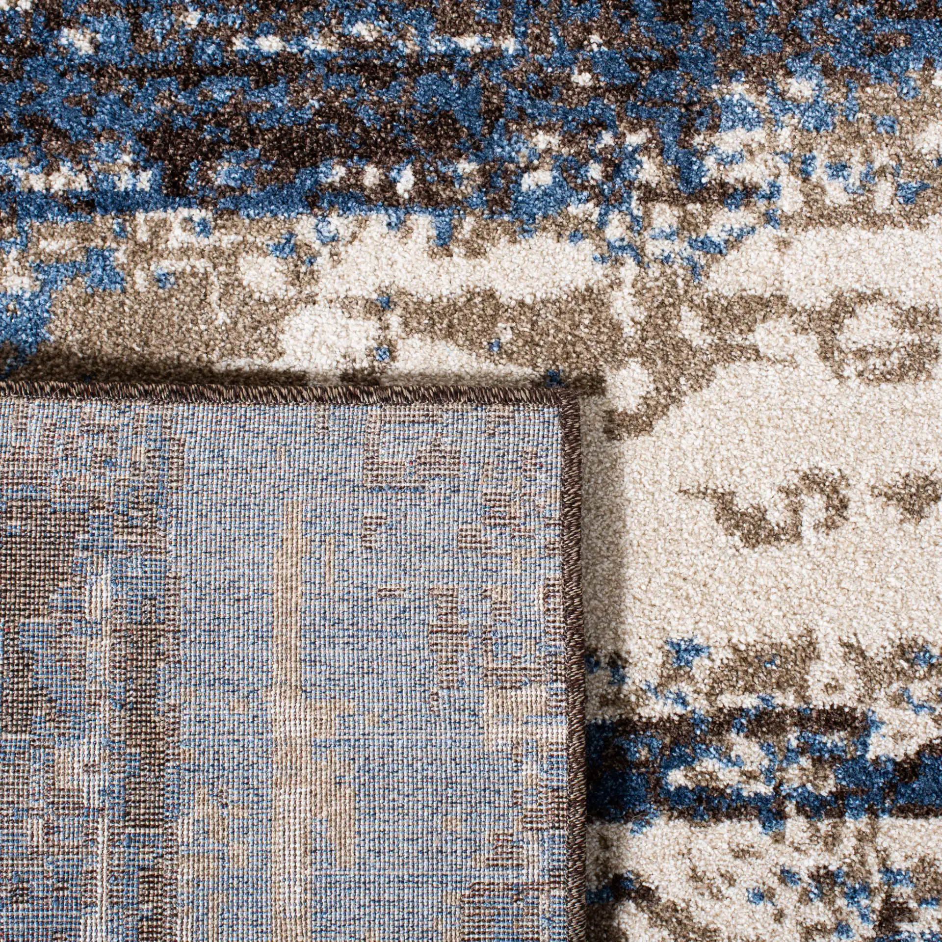 Retro Abstract Stripe Rug in Cream / Blue in a styled room
